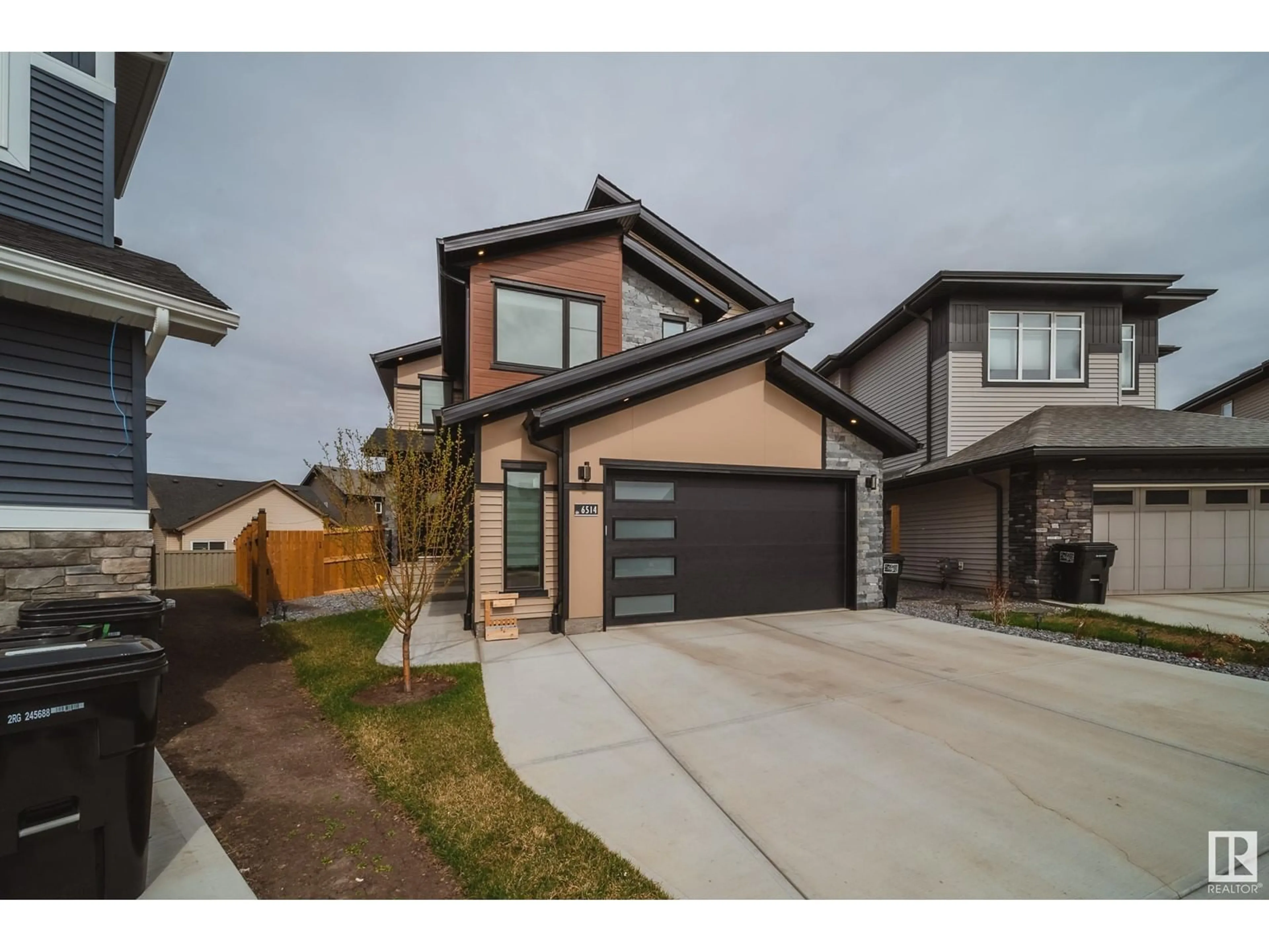 Home with brick exterior material, street for 6514 CRAWFORD PL, Edmonton Alberta T6W3Y6