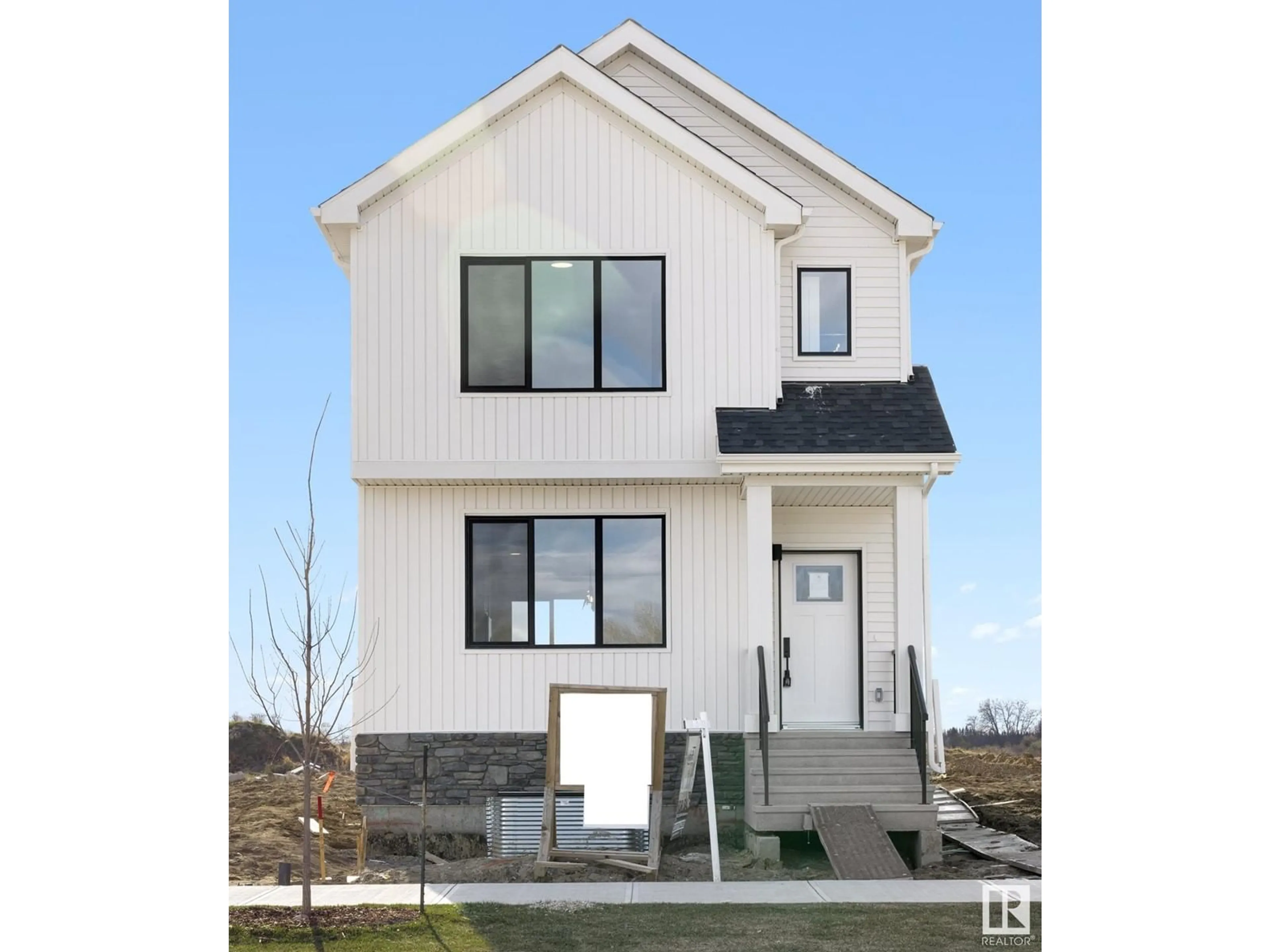 Home with vinyl exterior material, street for 117 BRICKYARD DR, Stony Plain Alberta T7Z0A0