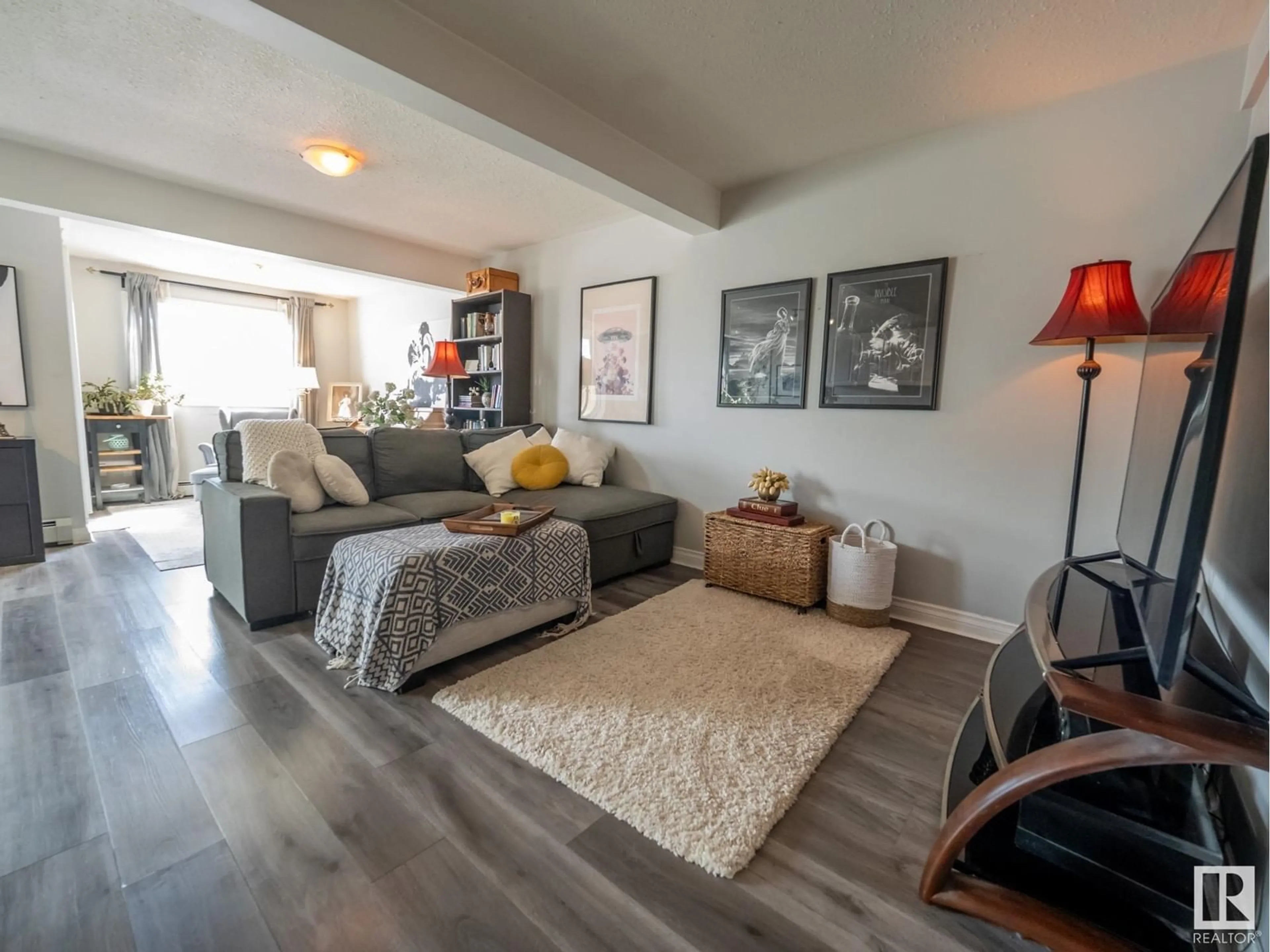 Living room with furniture, unknown for 219 - 11033 127 ST, Edmonton Alberta T5M2T5