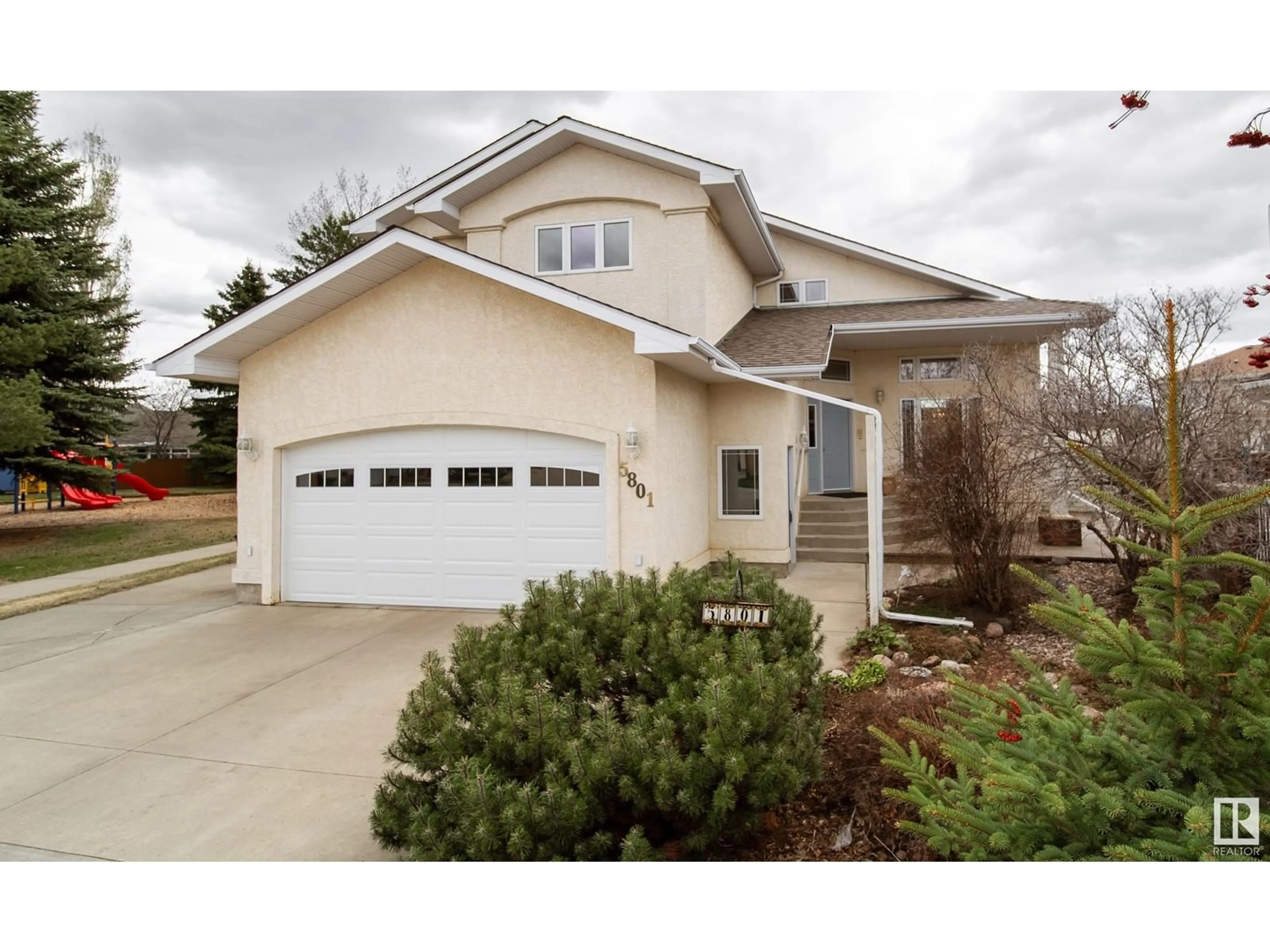 Home with vinyl exterior material, street for 5801 48 AV, Beaumont Alberta T4X1C1