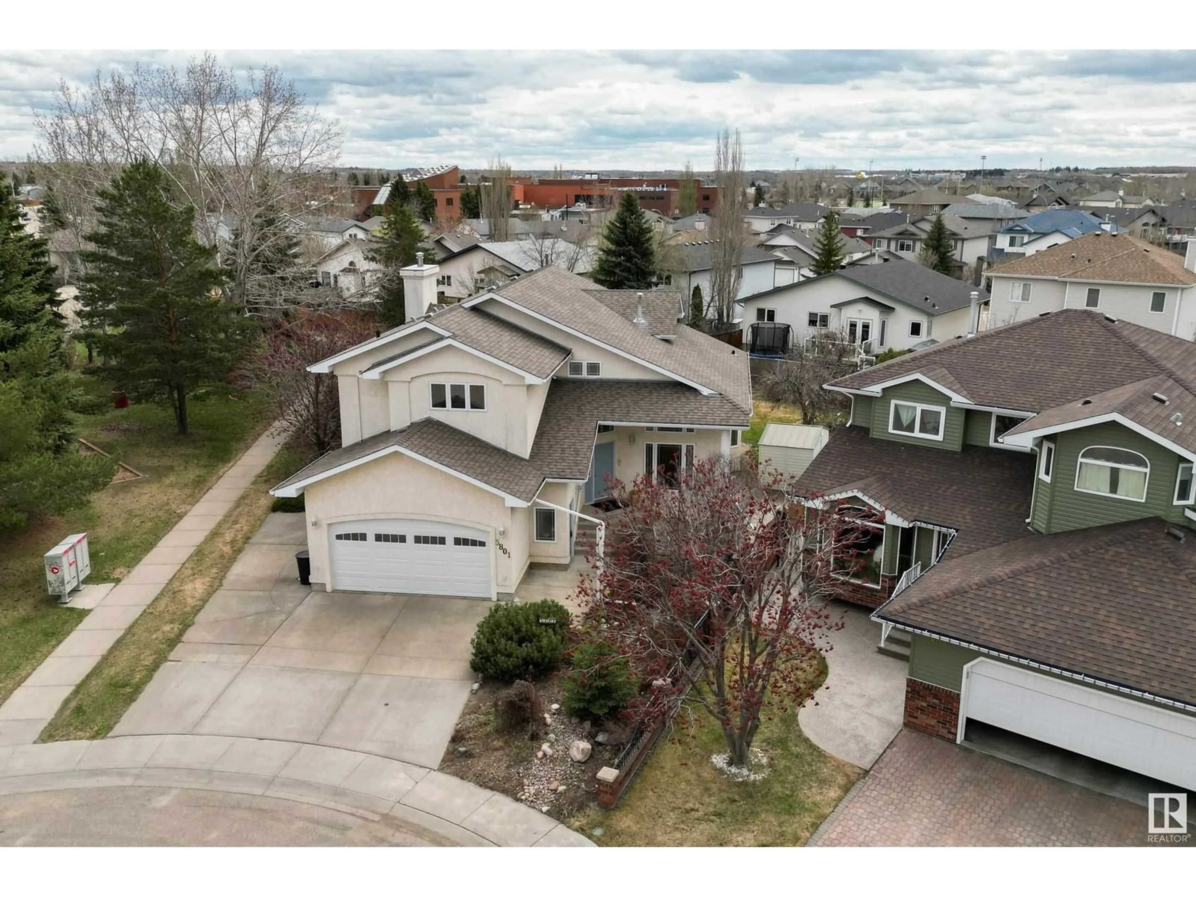 A pic from outside/outdoor area/front of a property/back of a property/a pic from drone, street for 5801 48 AV, Beaumont Alberta T4X1C1