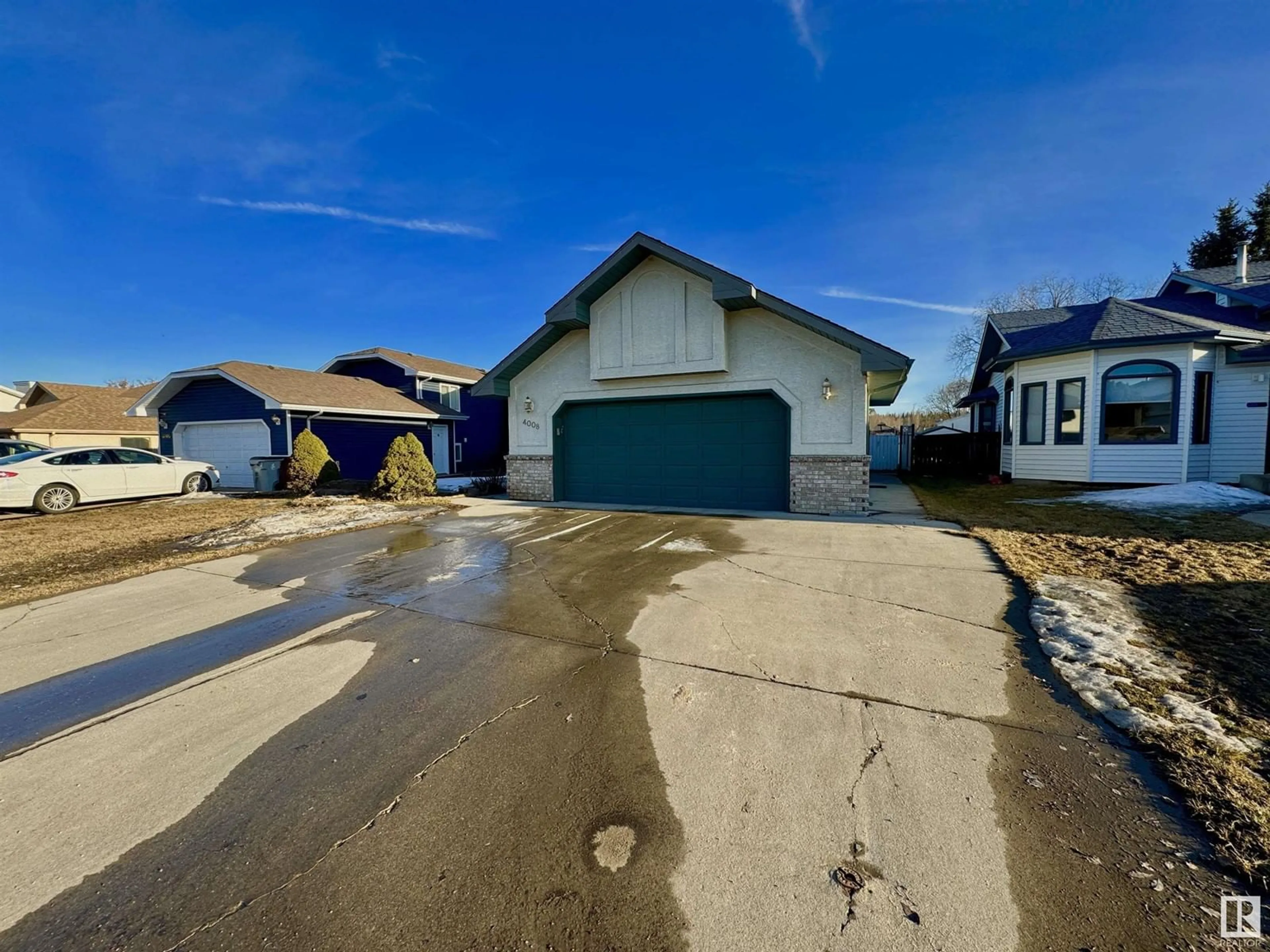 A pic from outside/outdoor area/front of a property/back of a property/a pic from drone, street for 4008 55 AV, Whitecourt Alberta T7S1C5