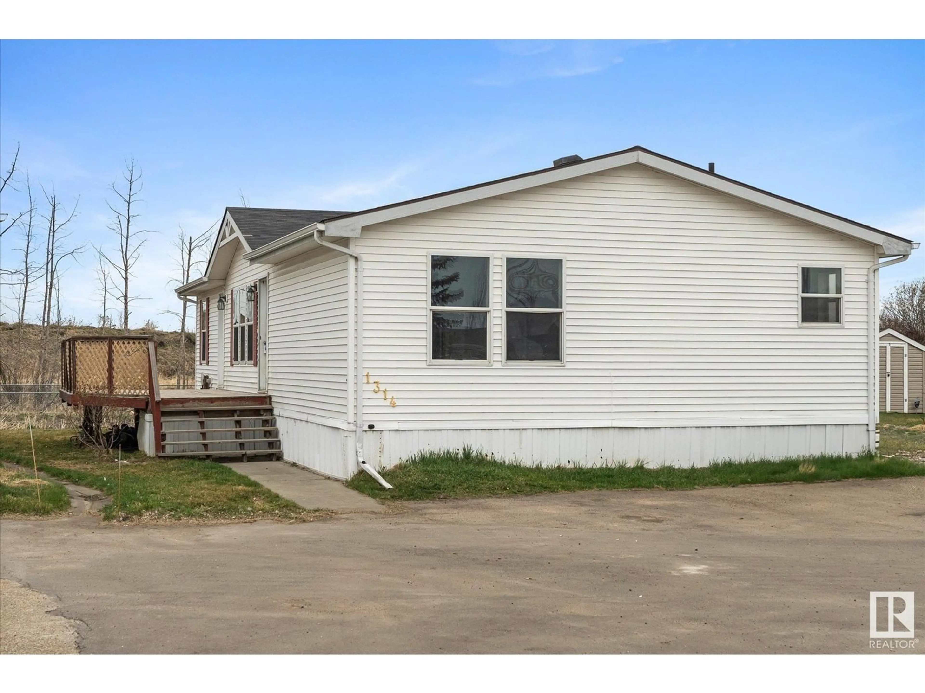 Home with vinyl exterior material, street for 53222 - 1314 RGE RD 272, Rural Parkland County Alberta T7X4M3
