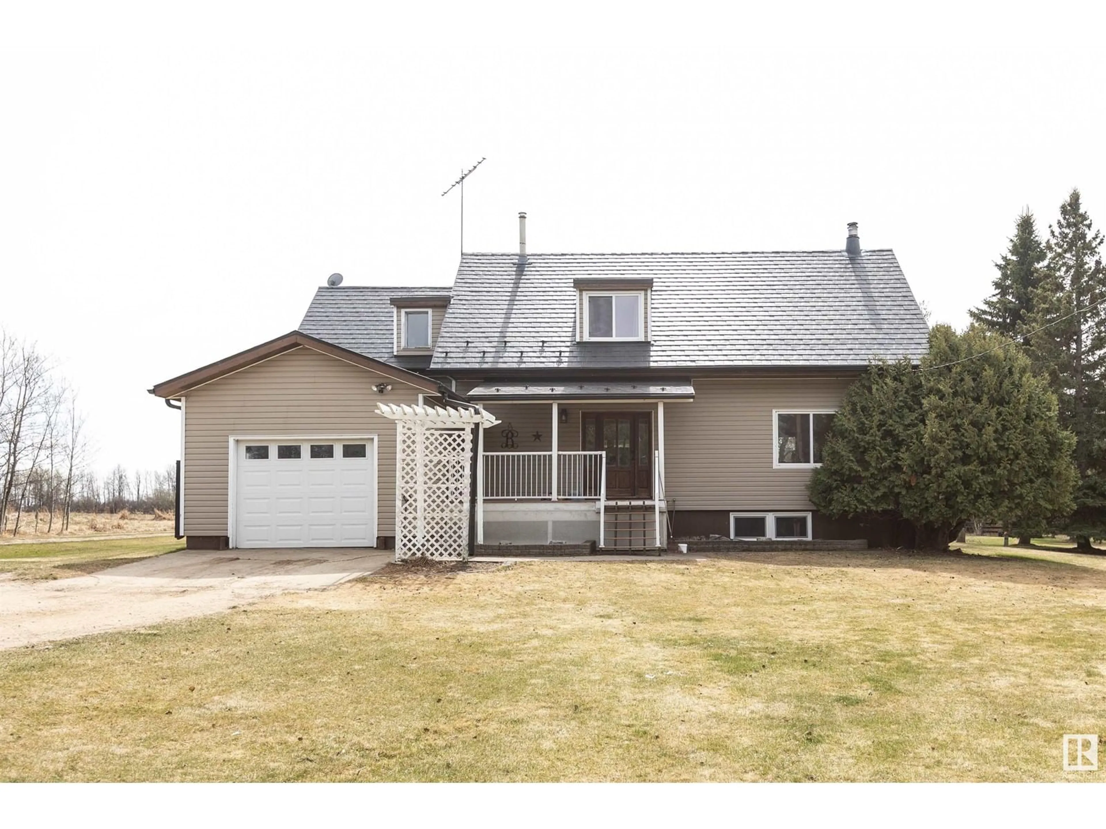 Home with vinyl exterior material, street for 1115 HWY 18, Rural Westlock County Alberta T7P2P6