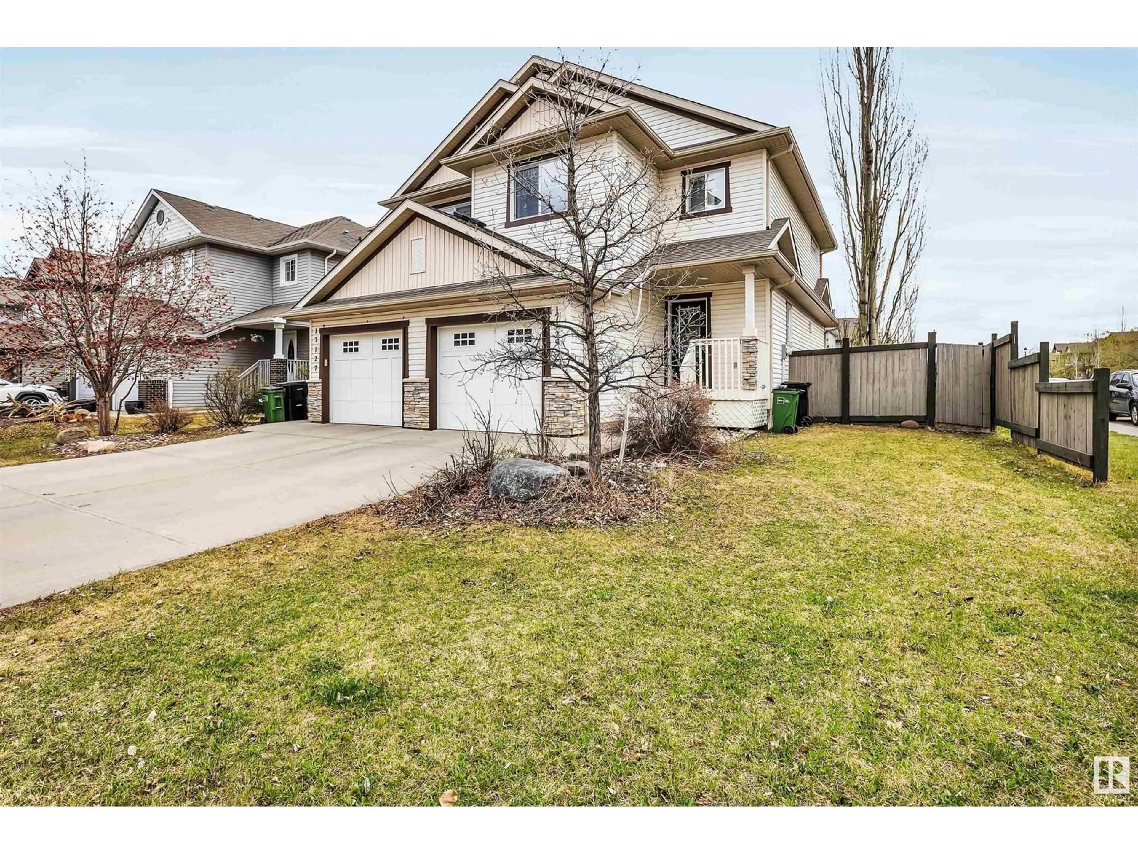 Home with vinyl exterior material, street for 17129 7A AV, Edmonton Alberta T6W0M5