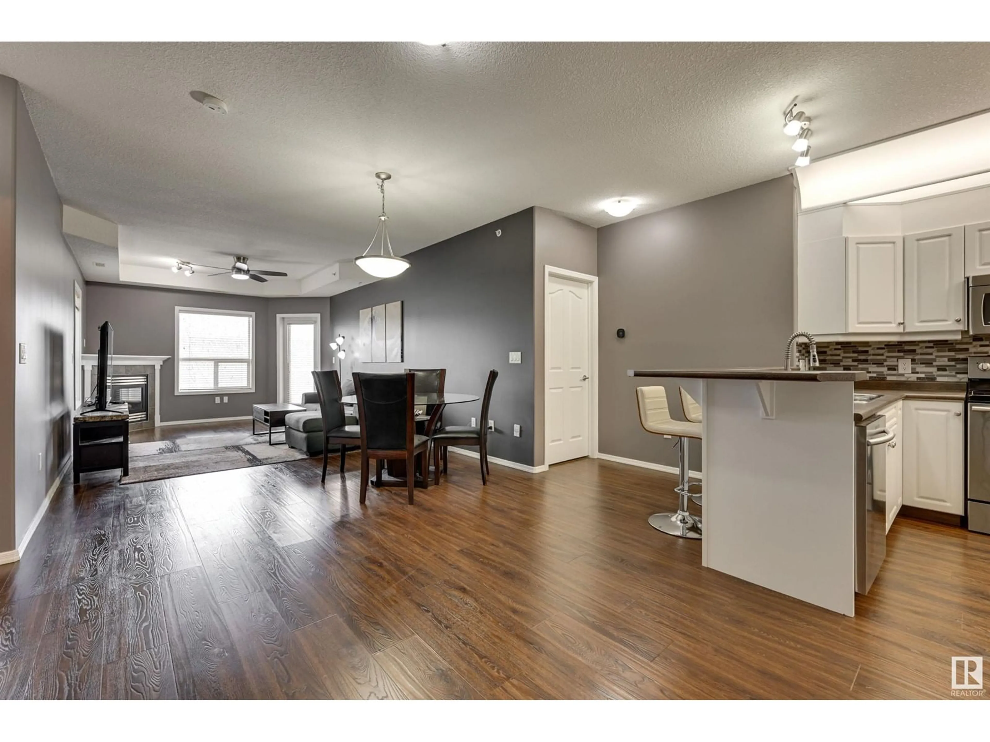 Open concept kitchen, wood/laminate floor for 416 - 9008 99 AV, Edmonton Alberta T5H4M6