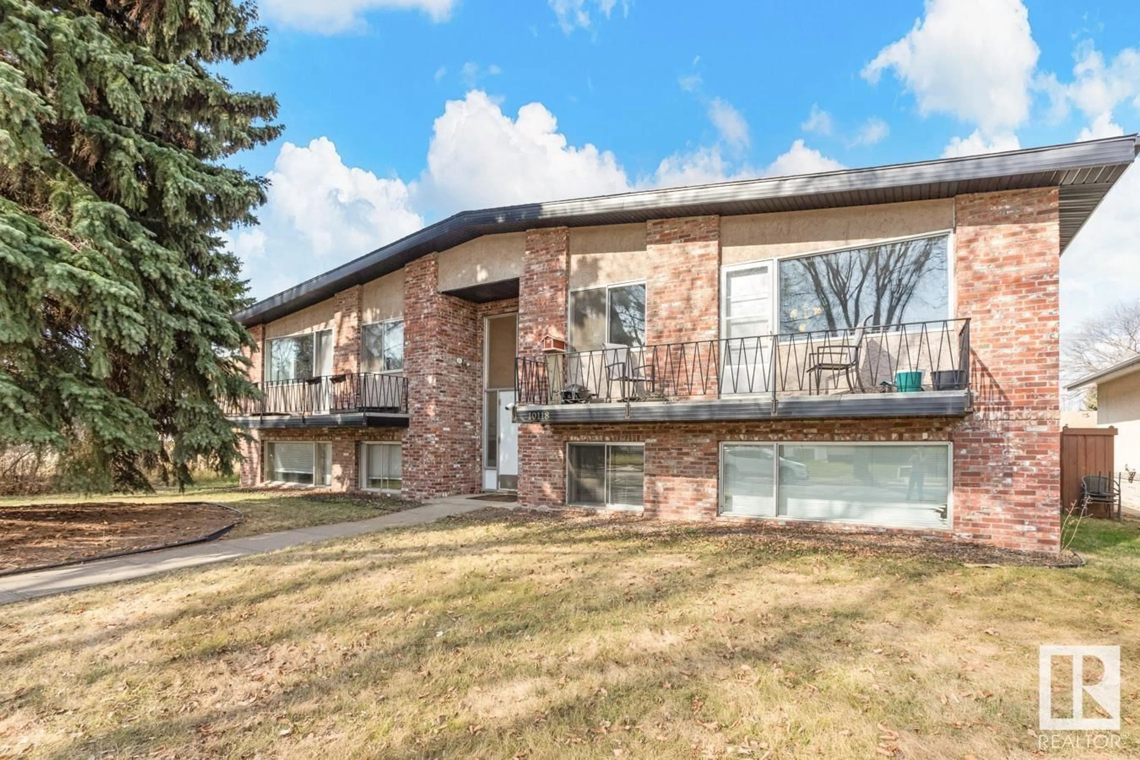 Home with brick exterior material, street for 10118 82 ST, Edmonton Alberta T6A3M2