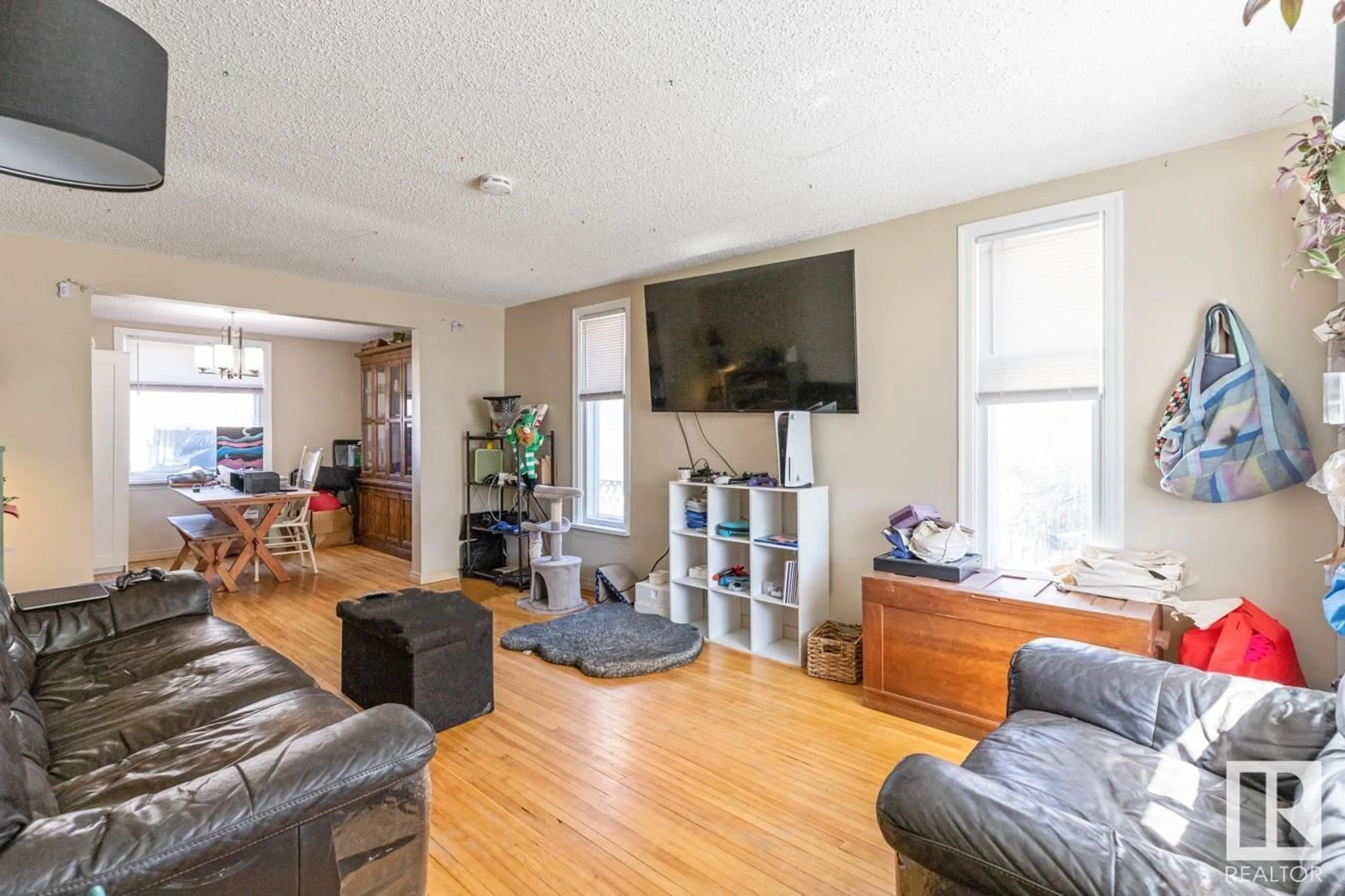 Living room with furniture, unknown for 10434 69 AV, Edmonton Alberta T6H2C3