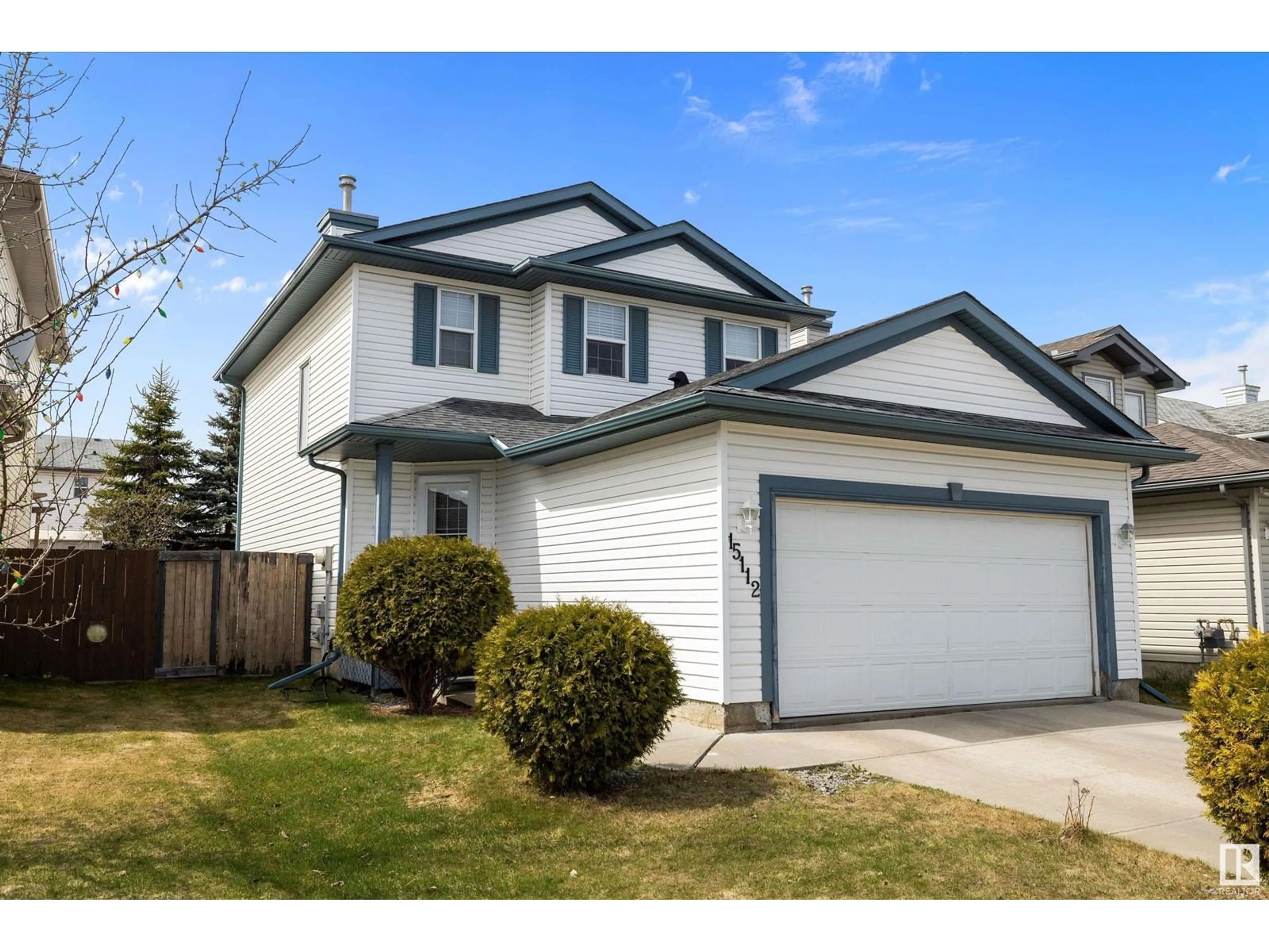 Home with vinyl exterior material, street for 15112 43 ST, Edmonton Alberta T5Y3A9