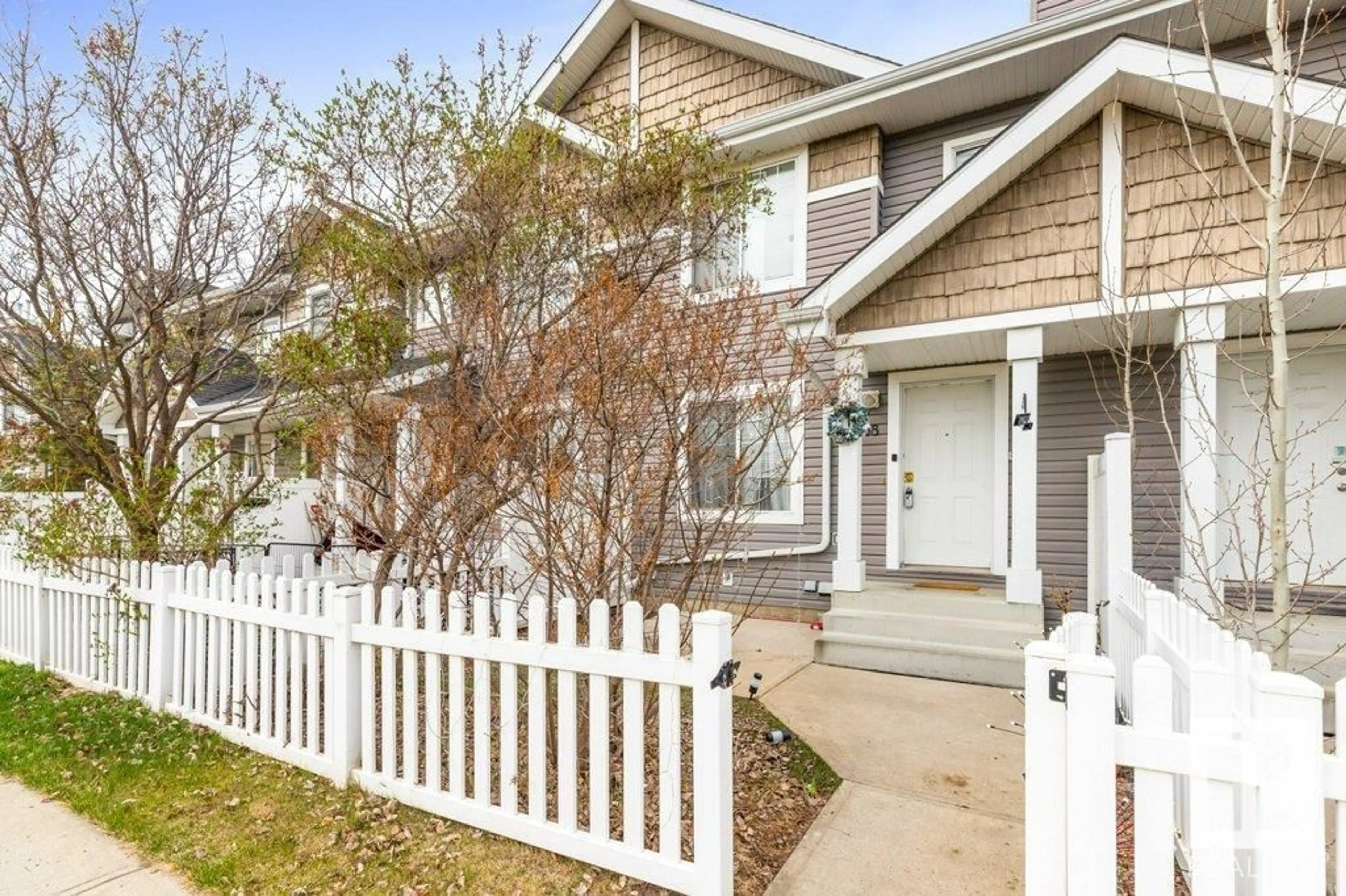 Home with vinyl exterior material, street for 68 3075 TRELLE CR NW, Edmonton Alberta T6R3V5