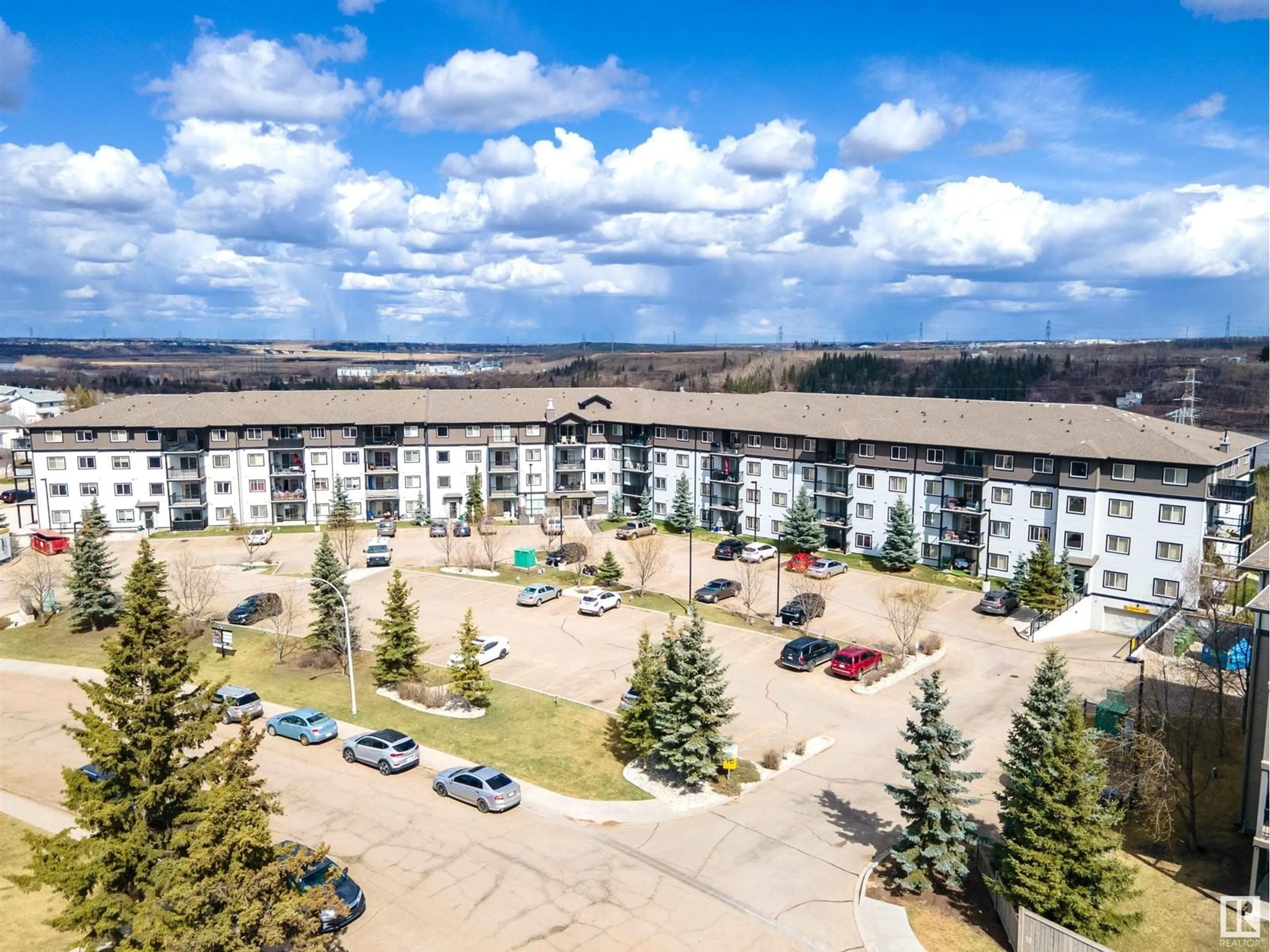 A pic from outside/outdoor area/front of a property/back of a property/a pic from drone, mountain view for #352 - 1196 HYNDMAN RD, Edmonton Alberta T5E0P8