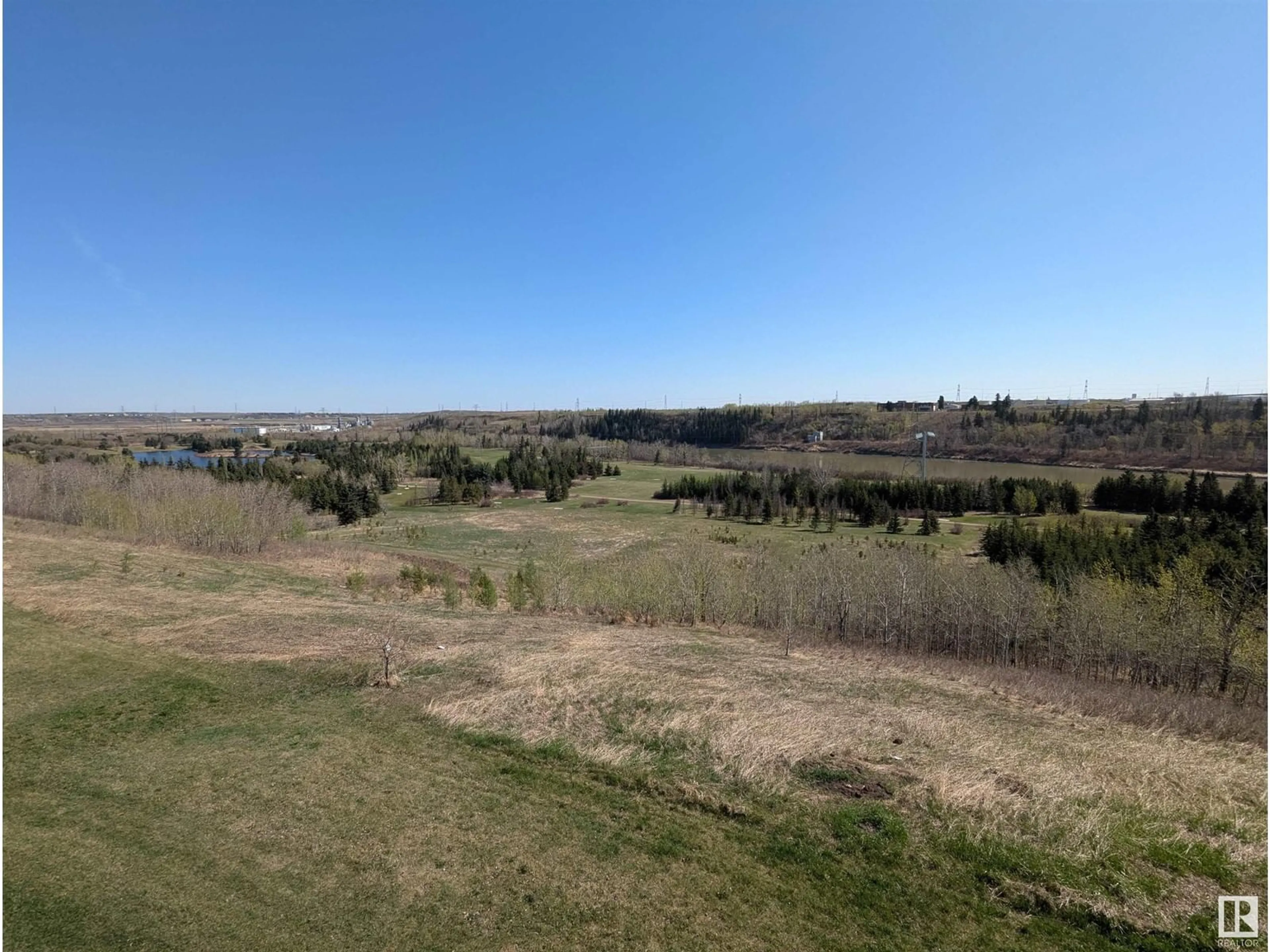 A pic from outside/outdoor area/front of a property/back of a property/a pic from drone, water/lake/river/ocean view for #352 - 1196 HYNDMAN RD, Edmonton Alberta T5E0P8