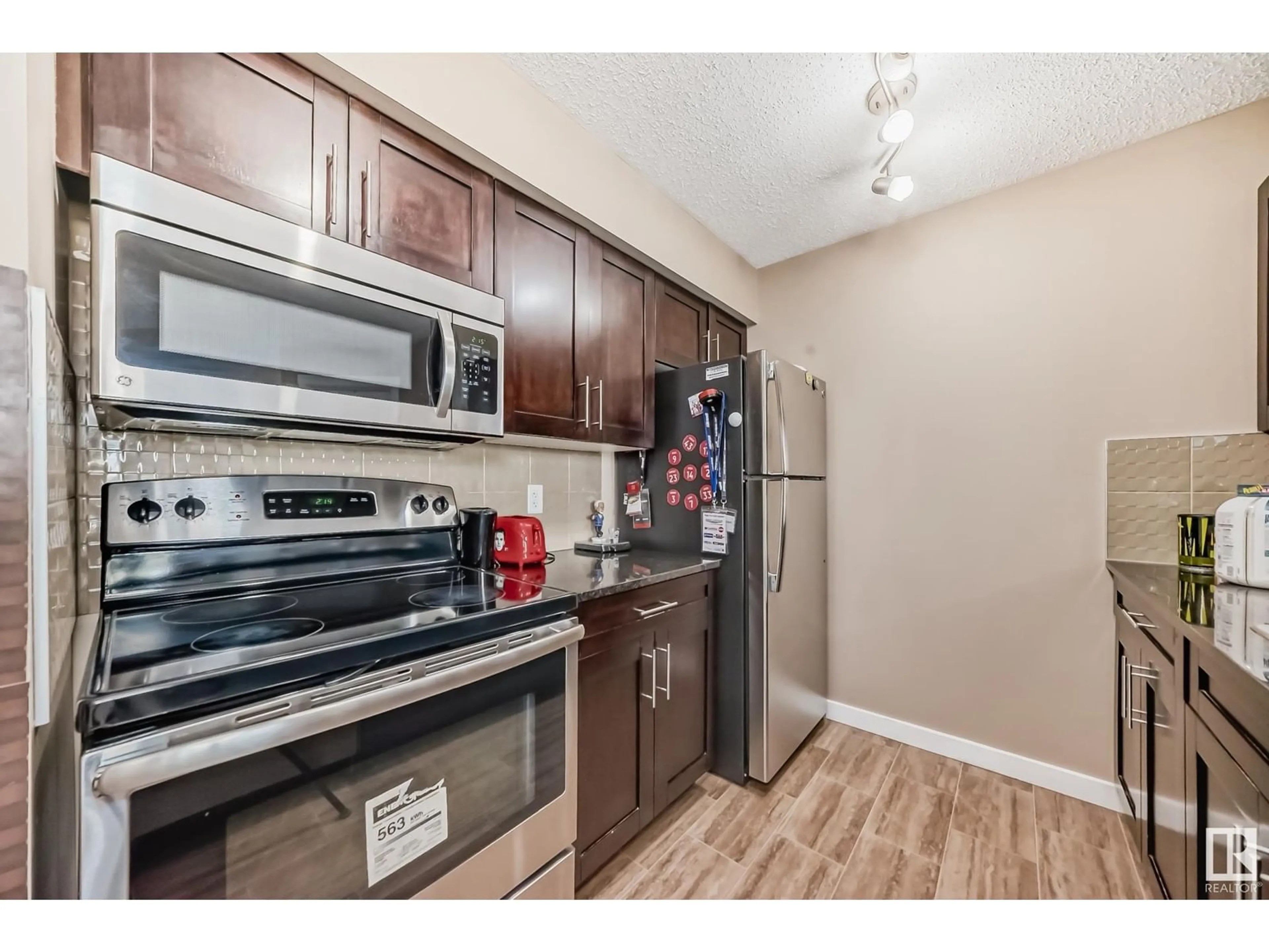 Standard kitchen, unknown for 209 - 3211 JAMES MOWATT TR, Edmonton Alberta T6W3L6