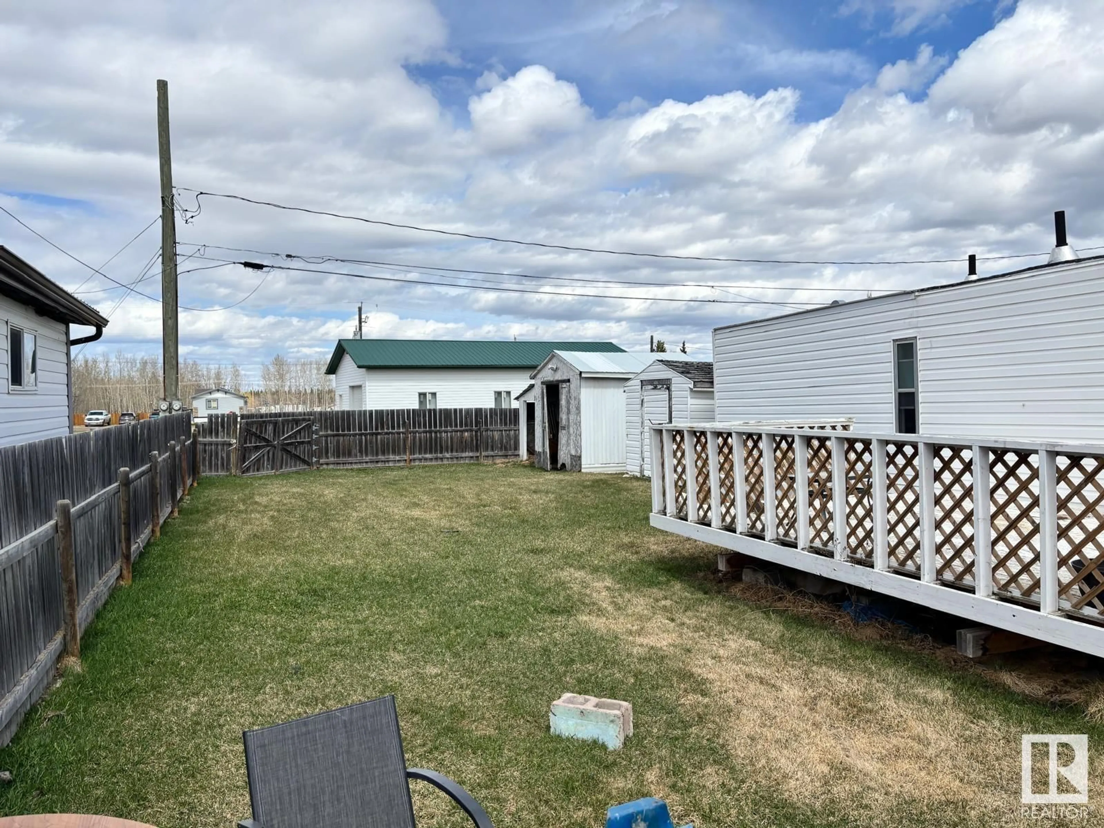 A pic from outside/outdoor area/front of a property/back of a property/a pic from drone, unknown for 204 COUNTRYSTYLE MHP, Drayton Valley Alberta T7A1L7