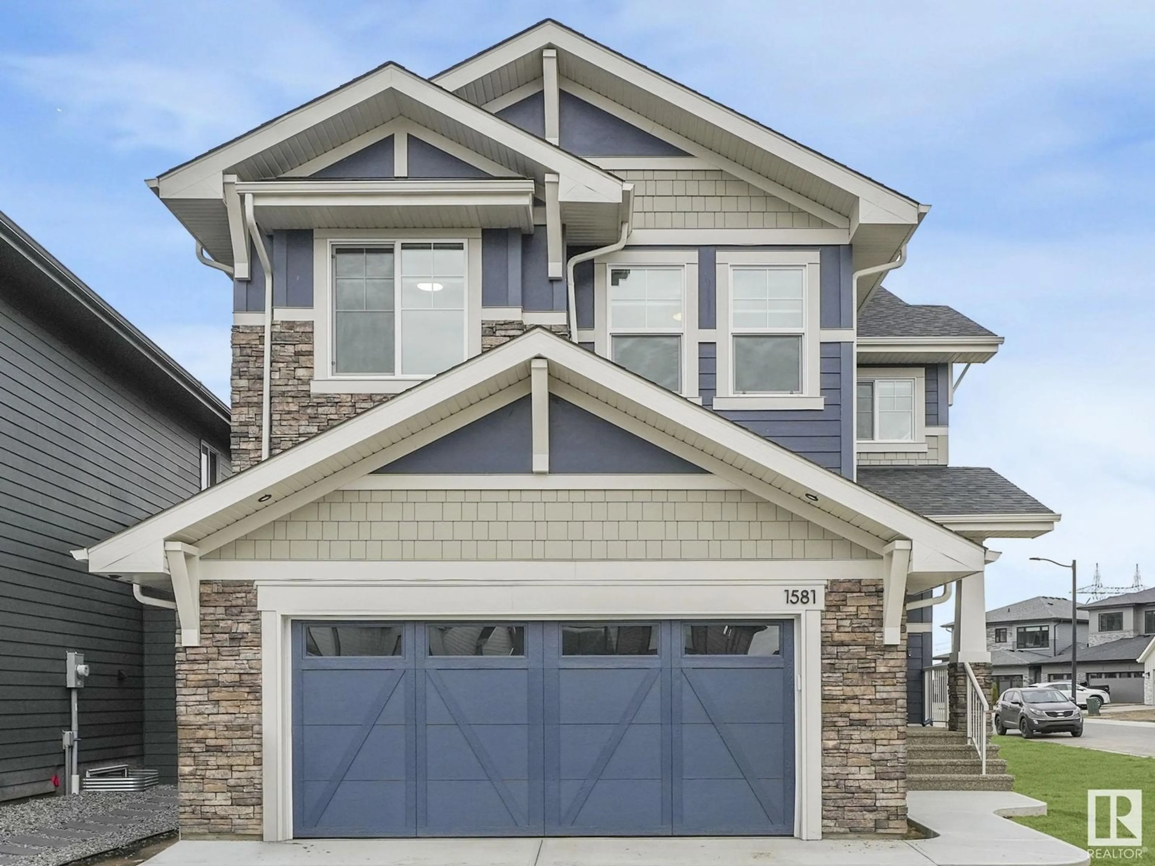 Home with vinyl exterior material, street for 1581 HOWES PL, Edmonton Alberta T6W5C1