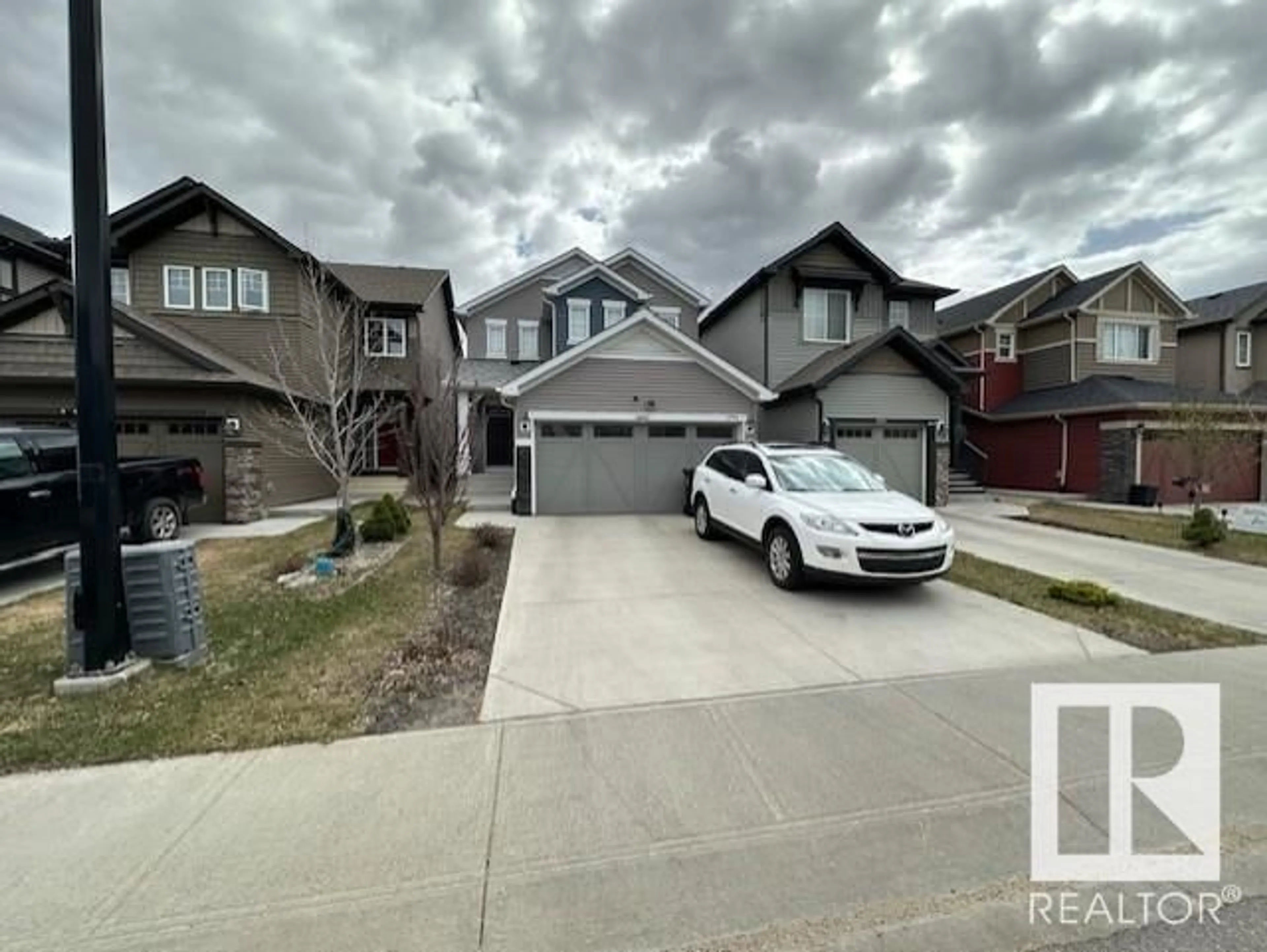 A pic from outside/outdoor area/front of a property/back of a property/a pic from drone, street for 1761 DUMONT CR, Edmonton Alberta T6W3V8