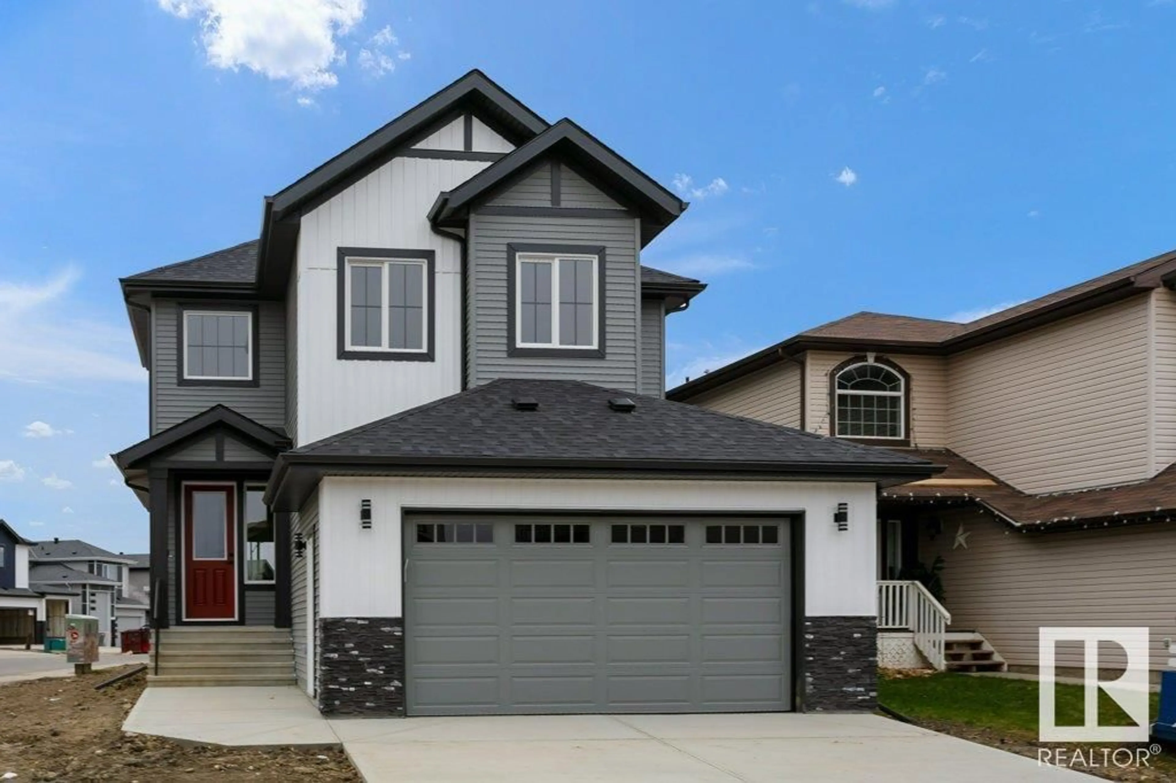 Home with vinyl exterior material, street for 67 DALQUIST BA, Leduc Alberta T9E1N7