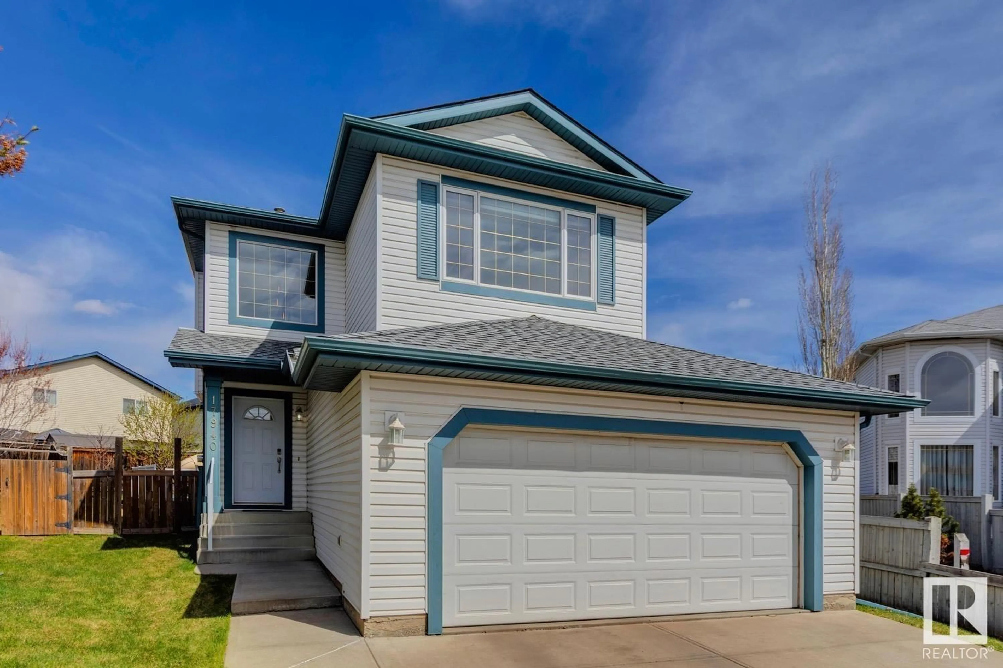 Home with vinyl exterior material, street for 17940 90 ST, Edmonton Alberta T5Z0A1