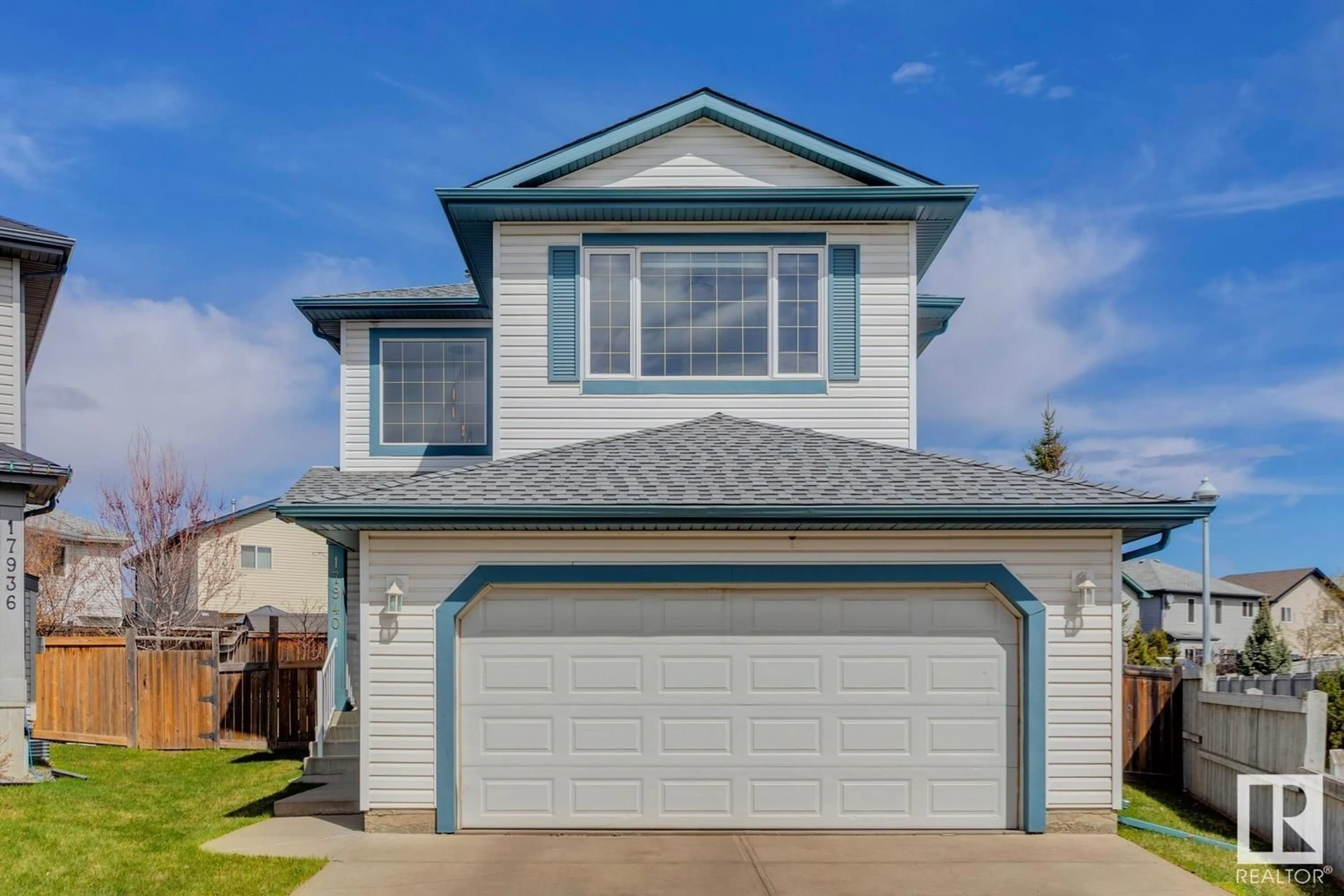 Home with vinyl exterior material, street for 17940 90 ST, Edmonton Alberta T5Z0A1