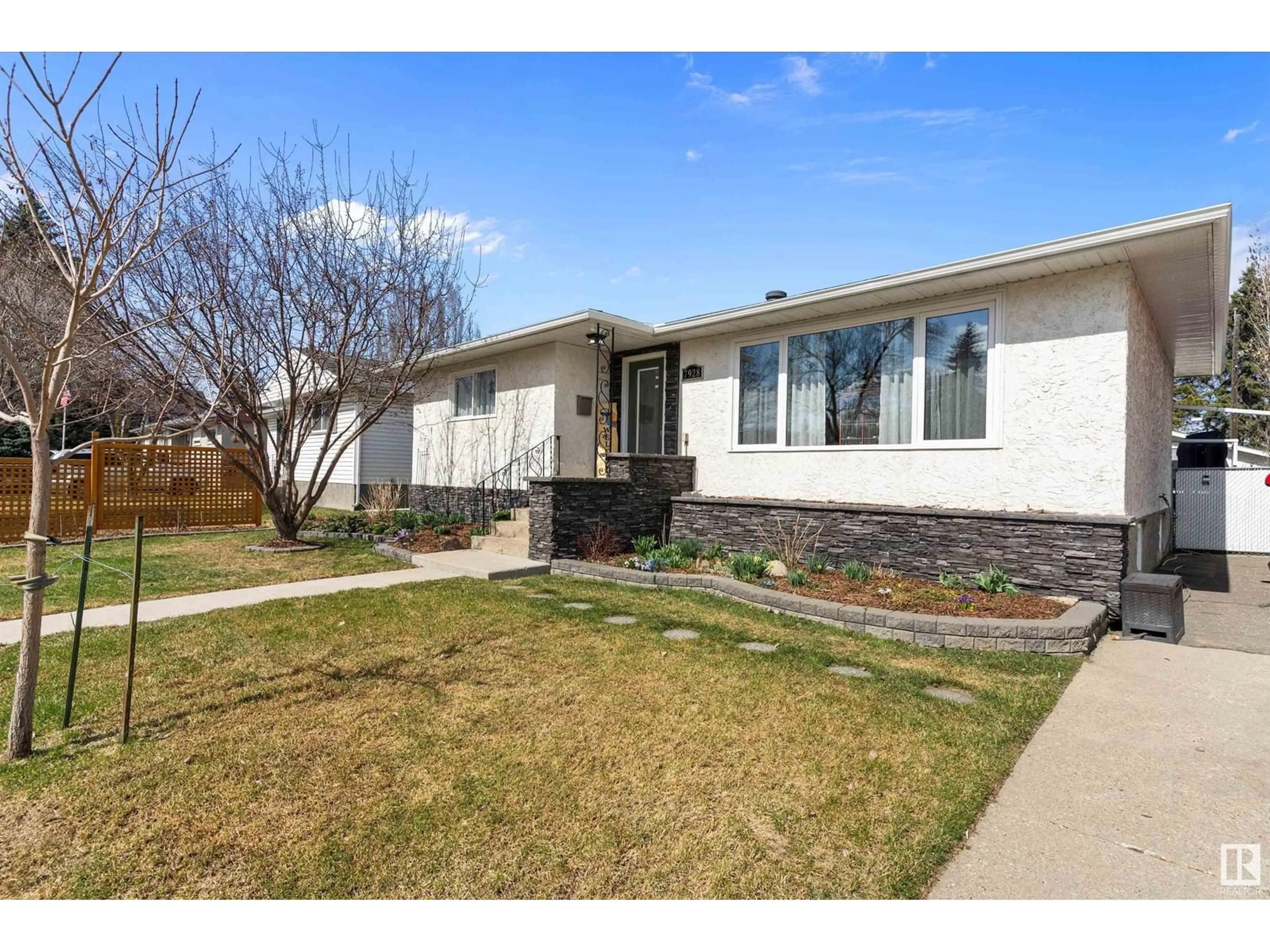 Home with brick exterior material, street for 7928 98 AV, Edmonton Alberta T6A0B4