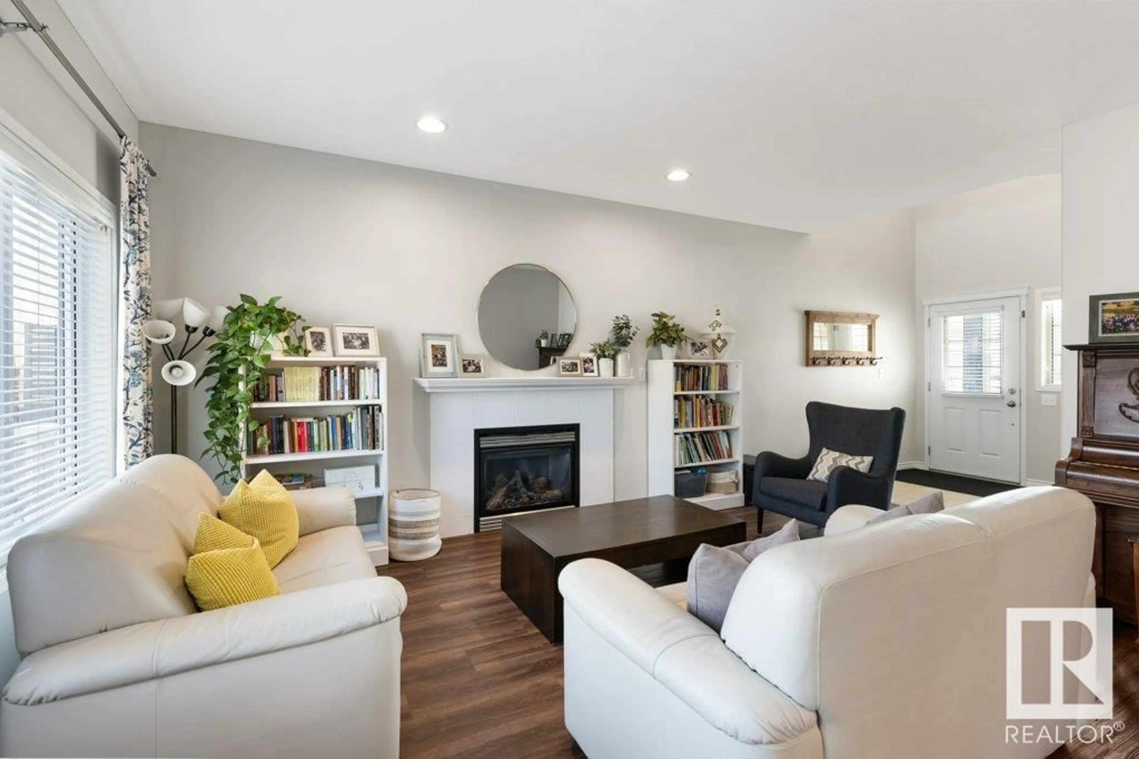 Living room with furniture, wood/laminate floor for 27 EVERITT DR, St. Albert Alberta T8N3T4