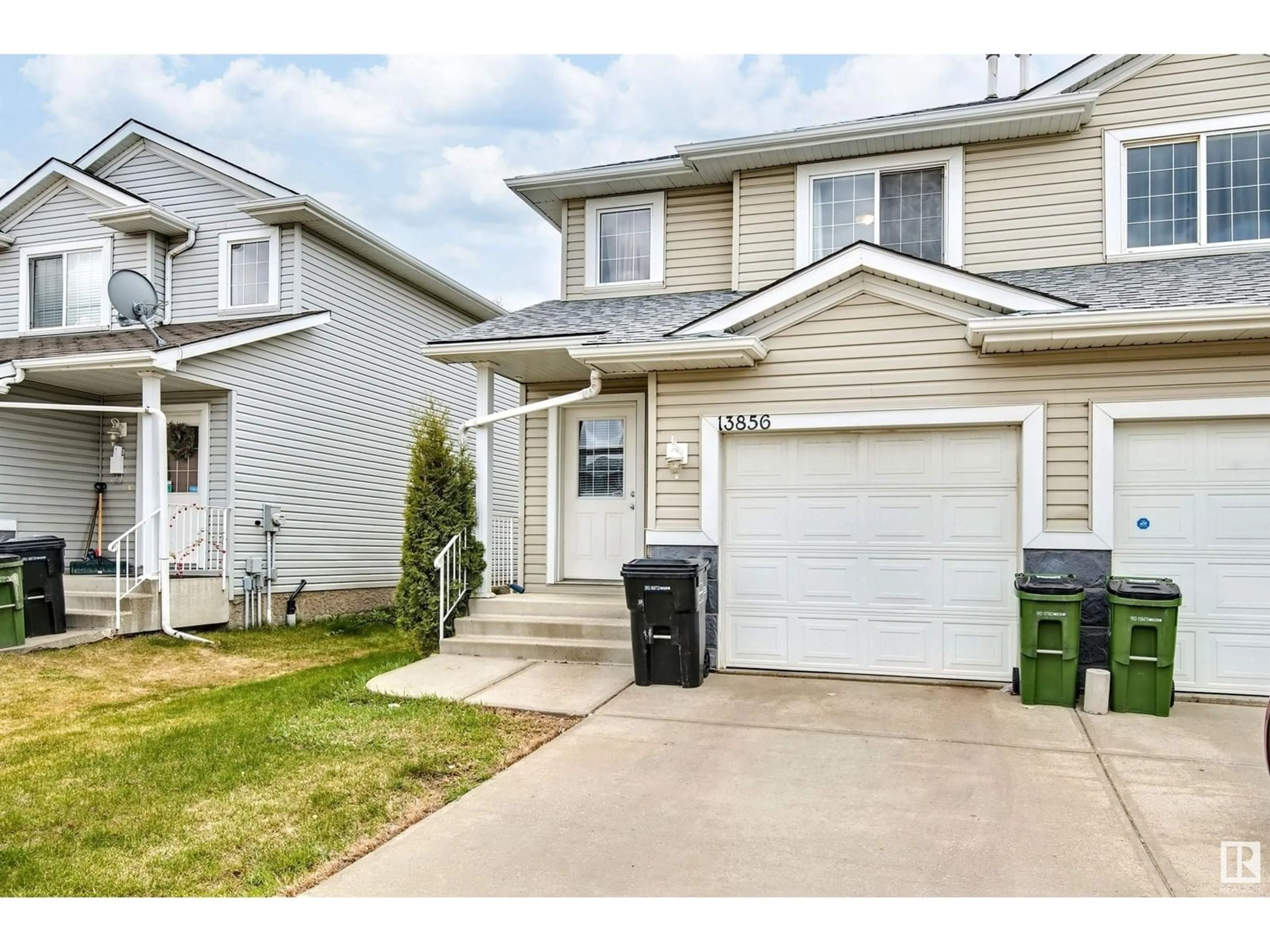 Home with vinyl exterior material, street for 13856 37 ST, Edmonton Alberta T5Y3G4