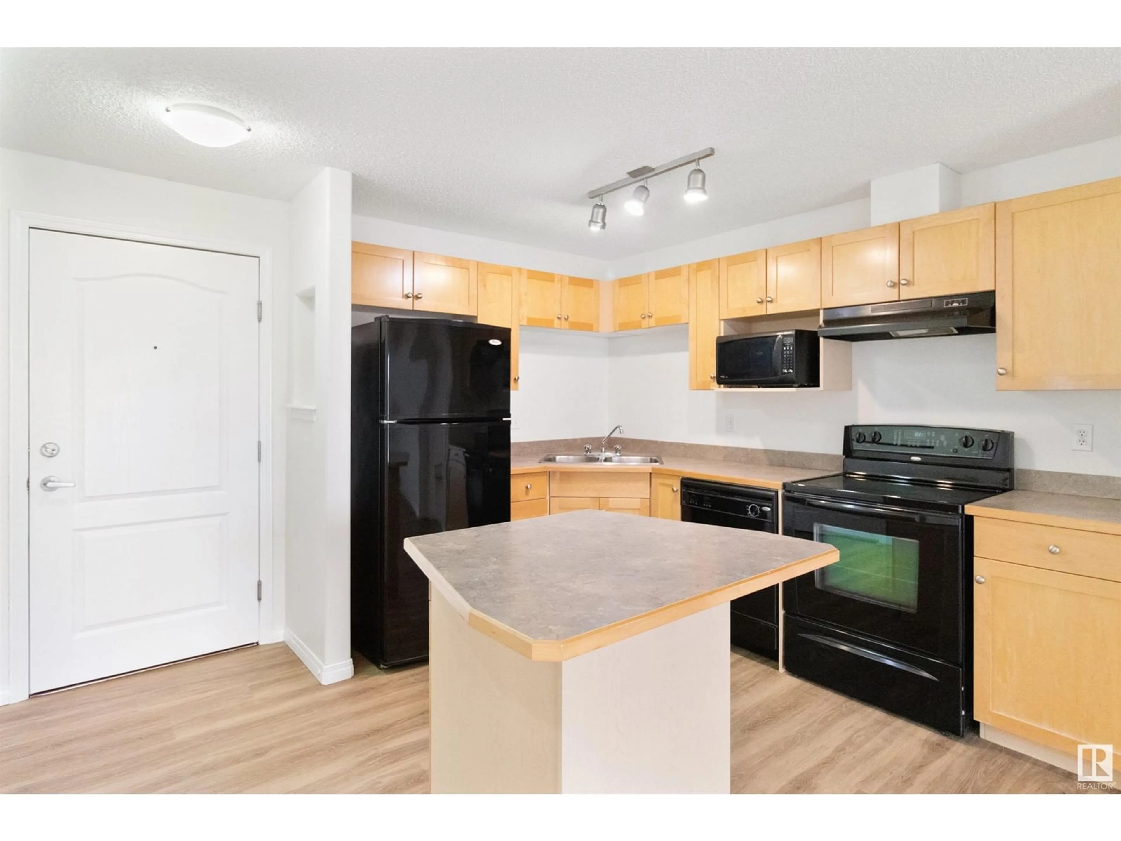 Standard kitchen, wood/laminate floor for #218 - 155 EDWARDS DR, Edmonton Alberta T6X1N6