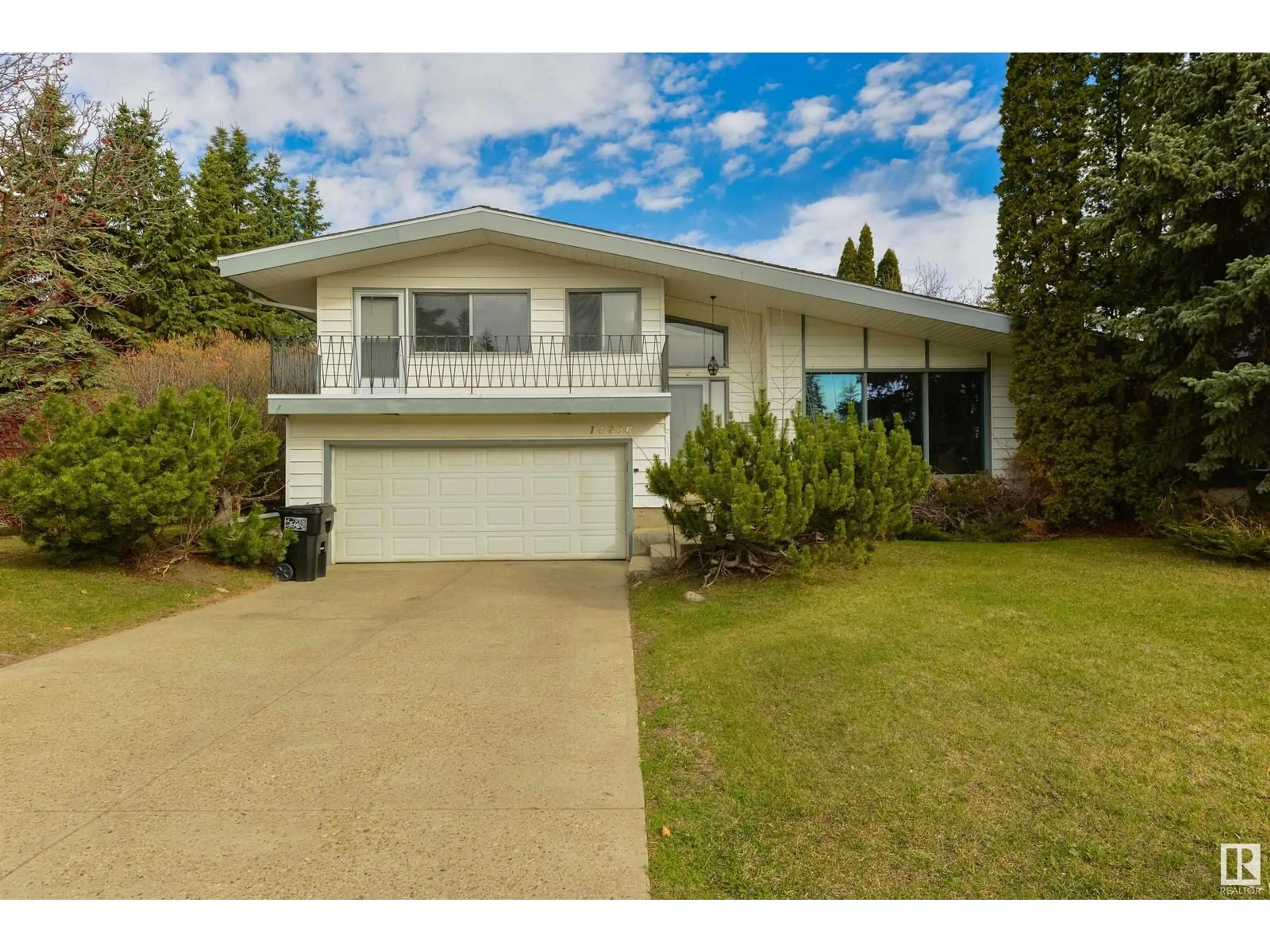 Home with vinyl exterior material, street for 14906 RIO TERRACE DR, Edmonton Alberta T5R5M4