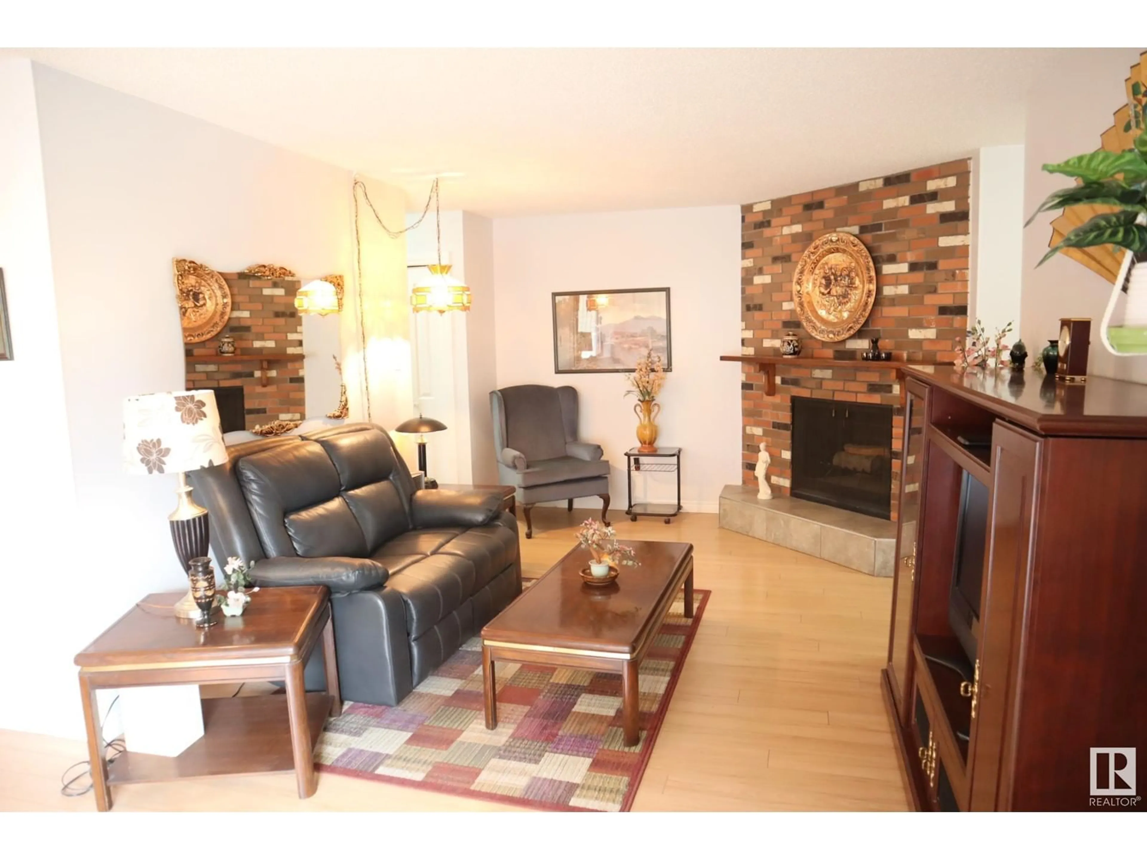 Living room with furniture, wood/laminate floor for #7 - 11535 108 AV, Edmonton Alberta T5H4C3