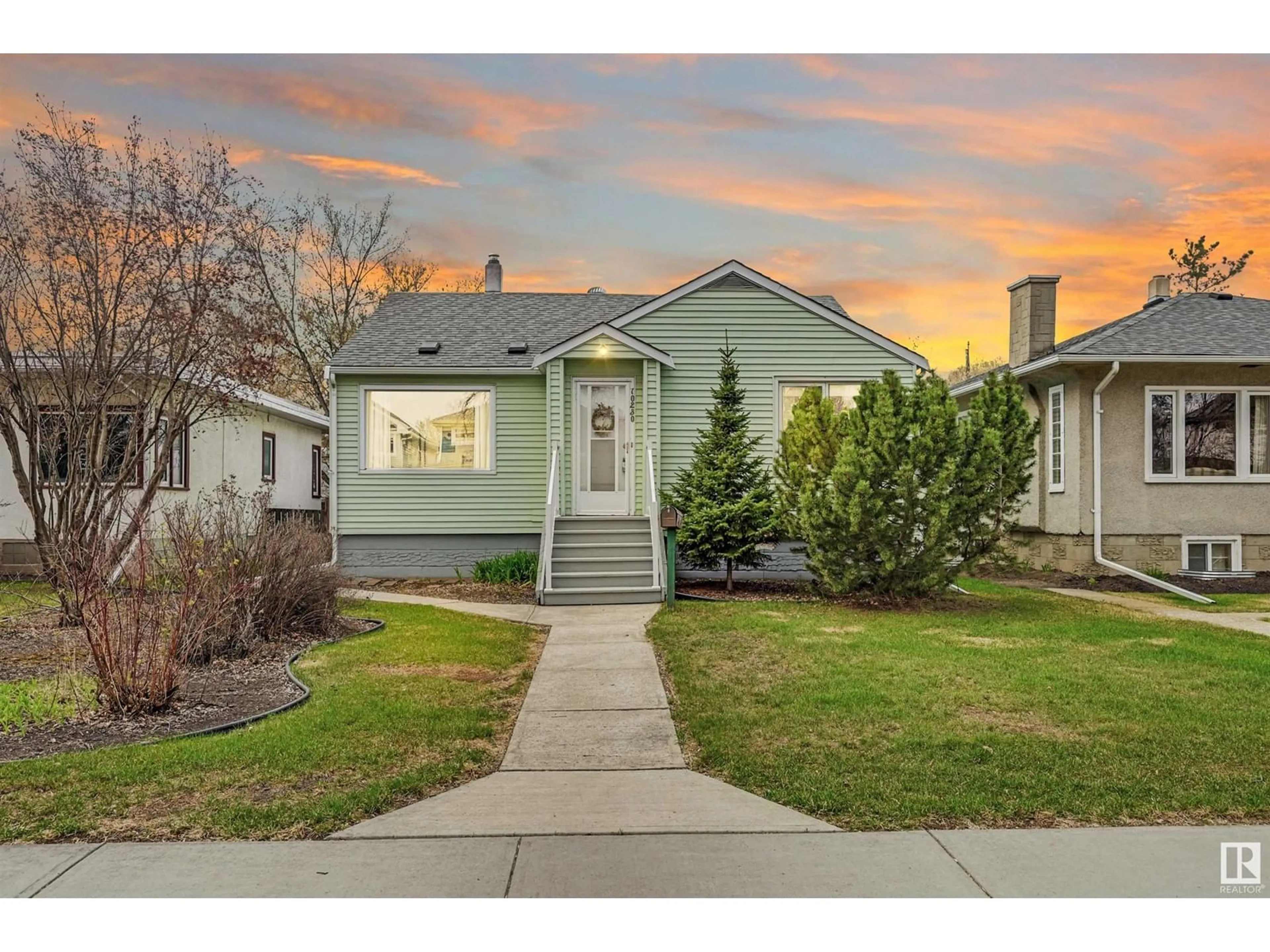 Home with vinyl exterior material, street for 10230 147 ST, Edmonton Alberta T5N3B9