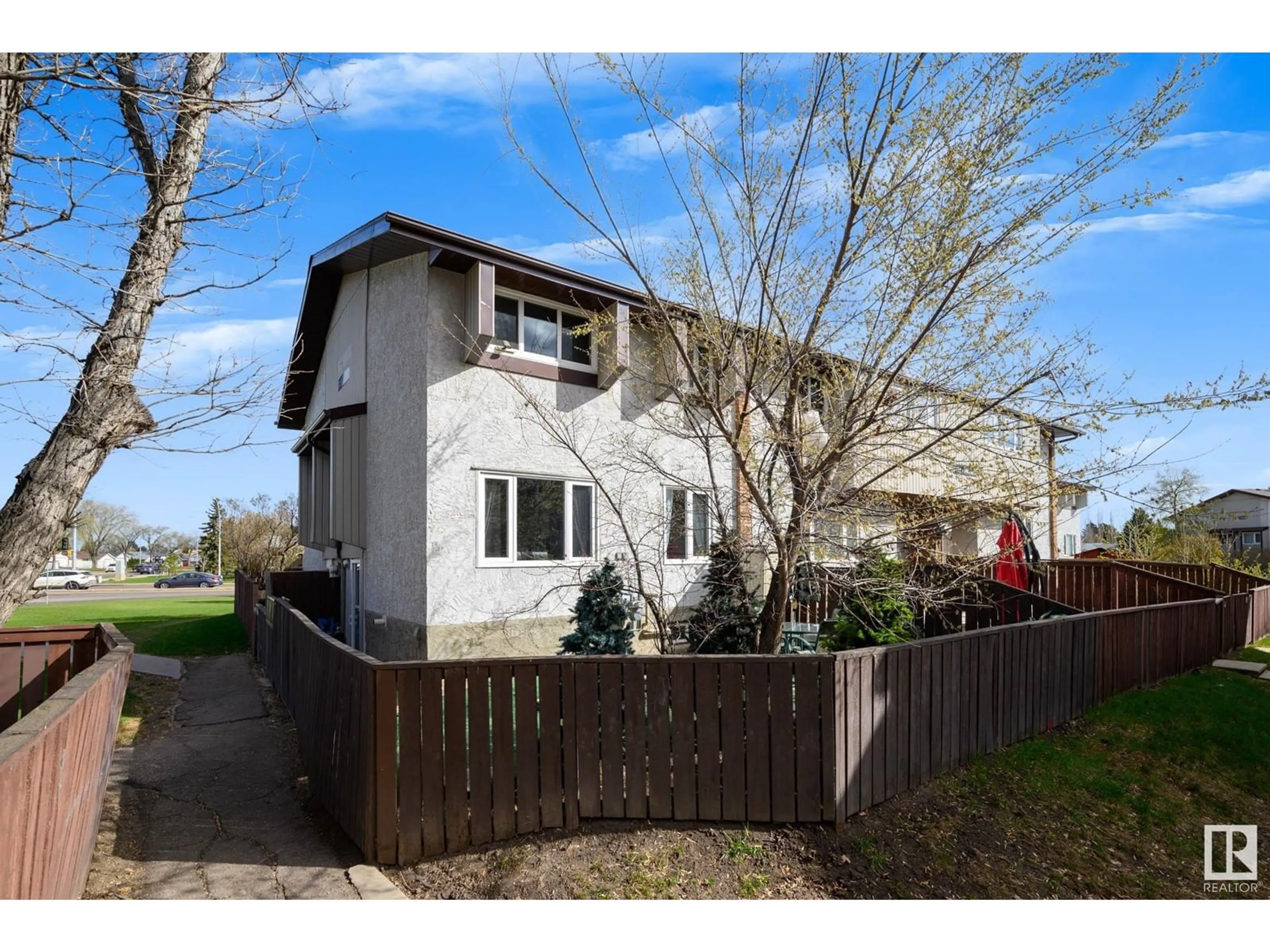 A pic from outside/outdoor area/front of a property/back of a property/a pic from drone, street for #7 - 8115 144 AV, Edmonton Alberta T5C2S4