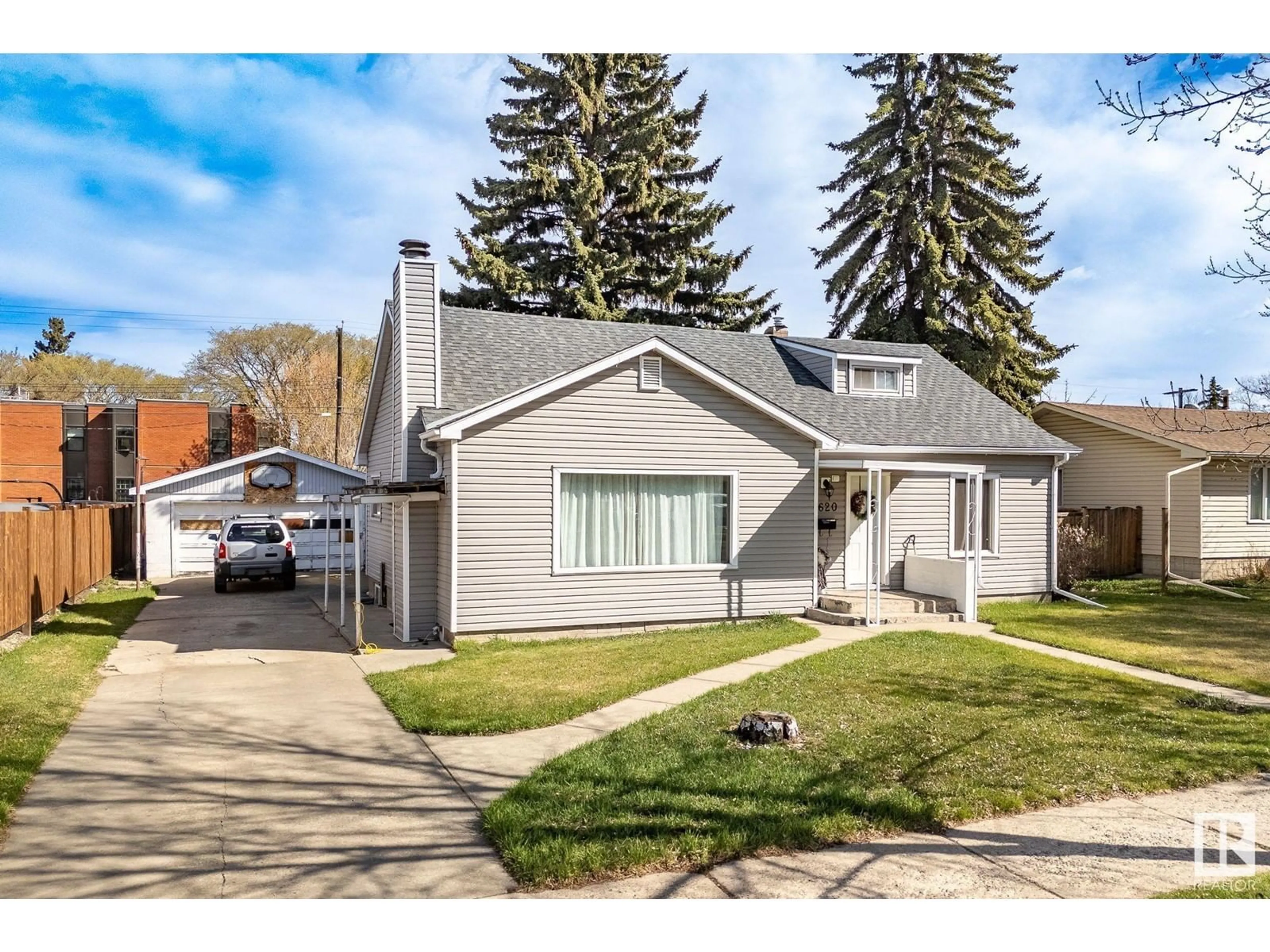 Home with vinyl exterior material, street for 3620 115 AV, Edmonton Alberta T5W0T9