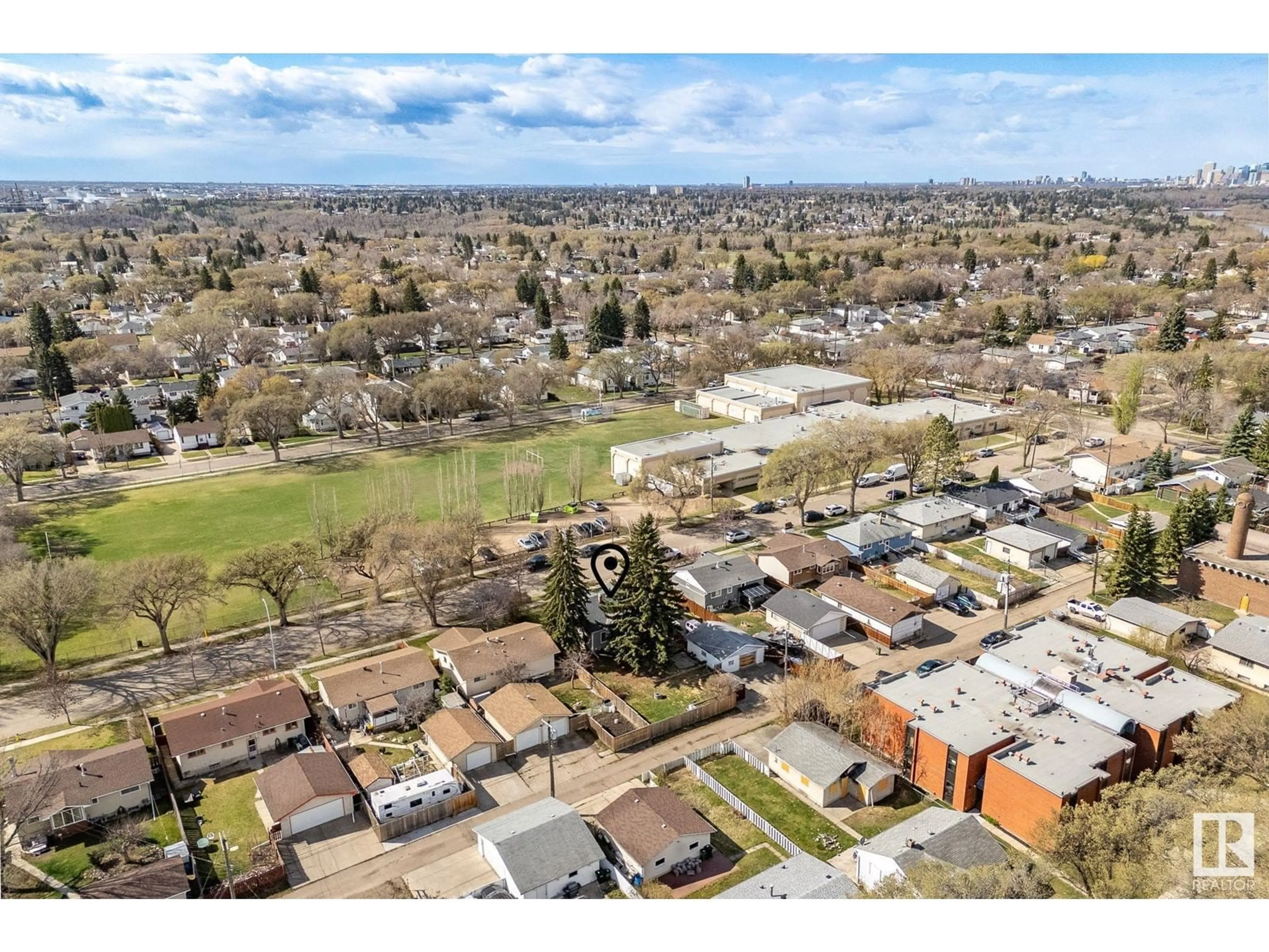 A pic from outside/outdoor area/front of a property/back of a property/a pic from drone, street for 3620 115 AV, Edmonton Alberta T5W0T9