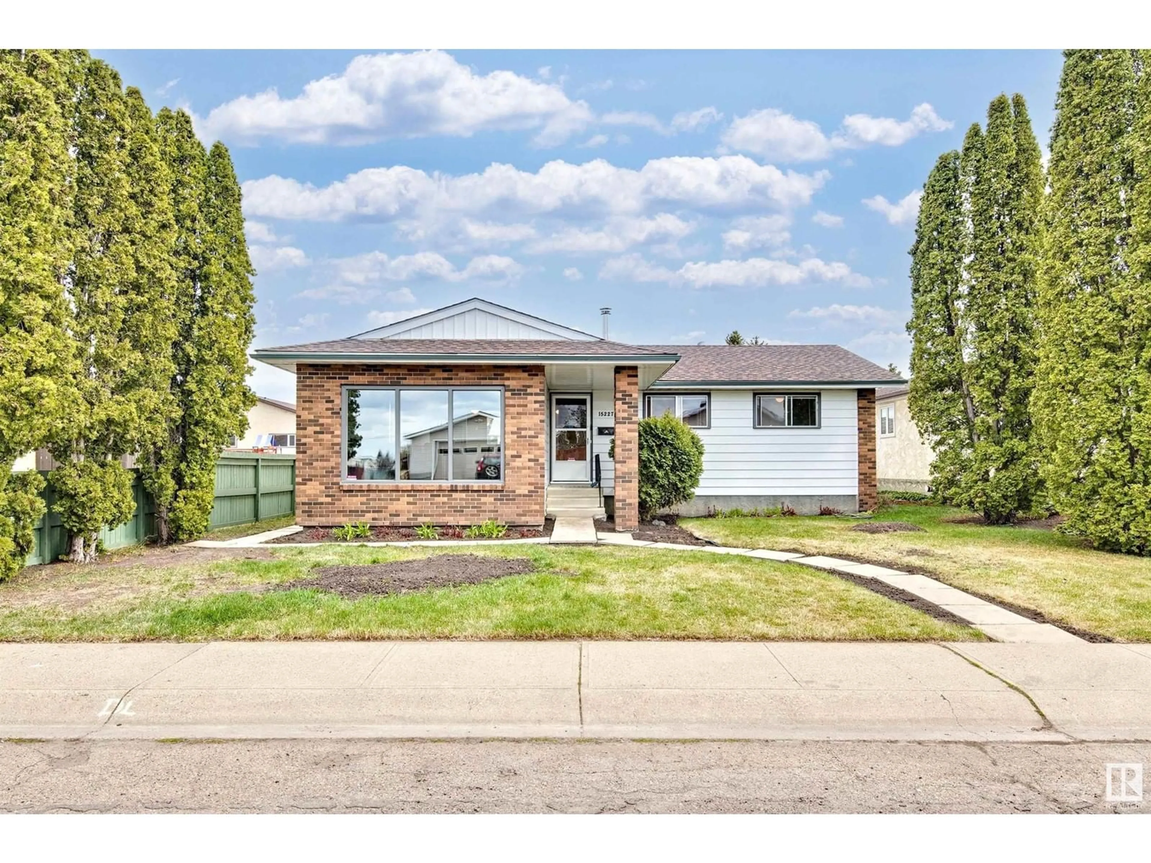 Home with brick exterior material, street for NW - 15227 119 ST, Edmonton Alberta T5X1K6