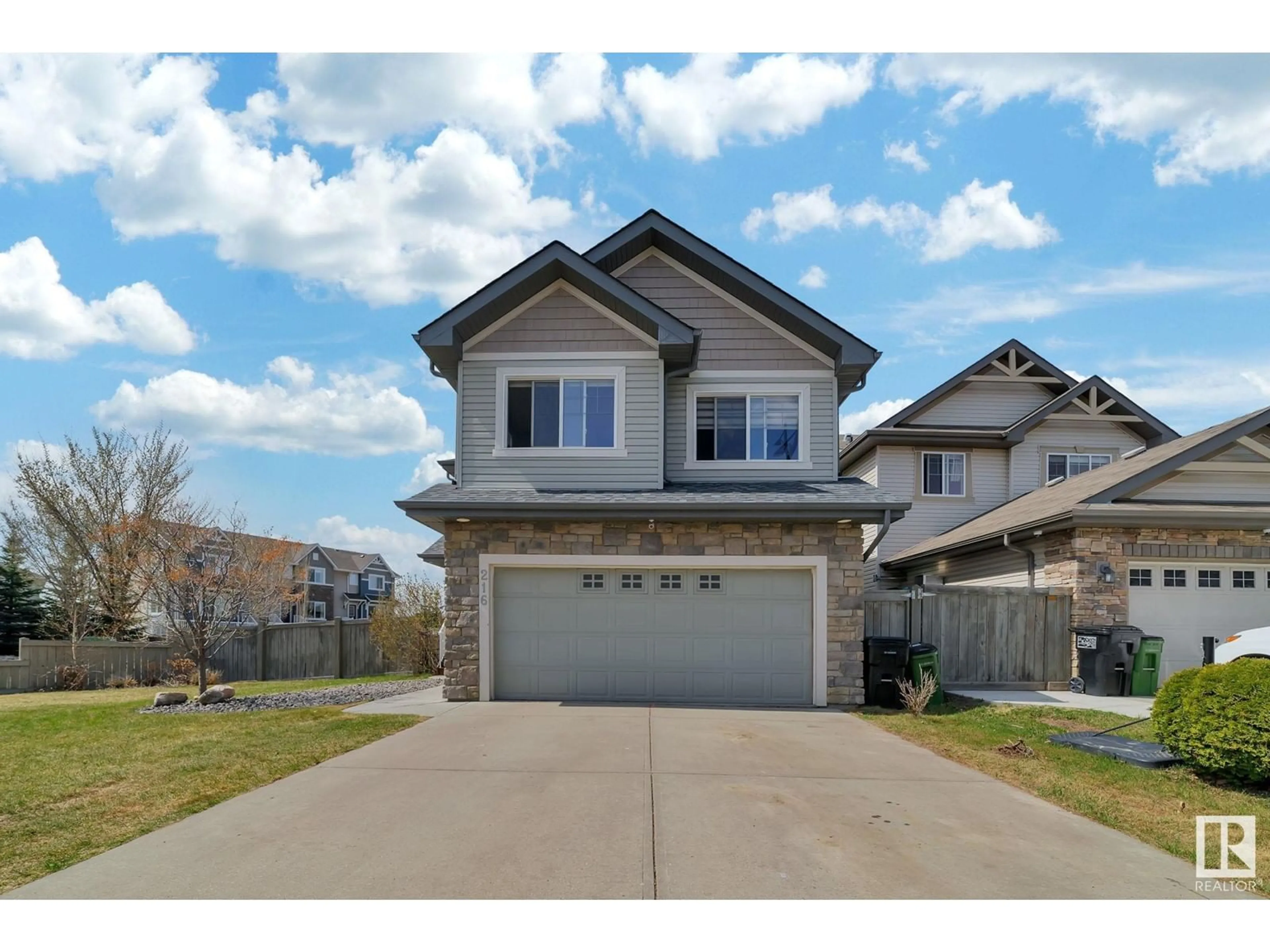 Home with vinyl exterior material, street for 216 55 ST, Edmonton Alberta T6X0L1
