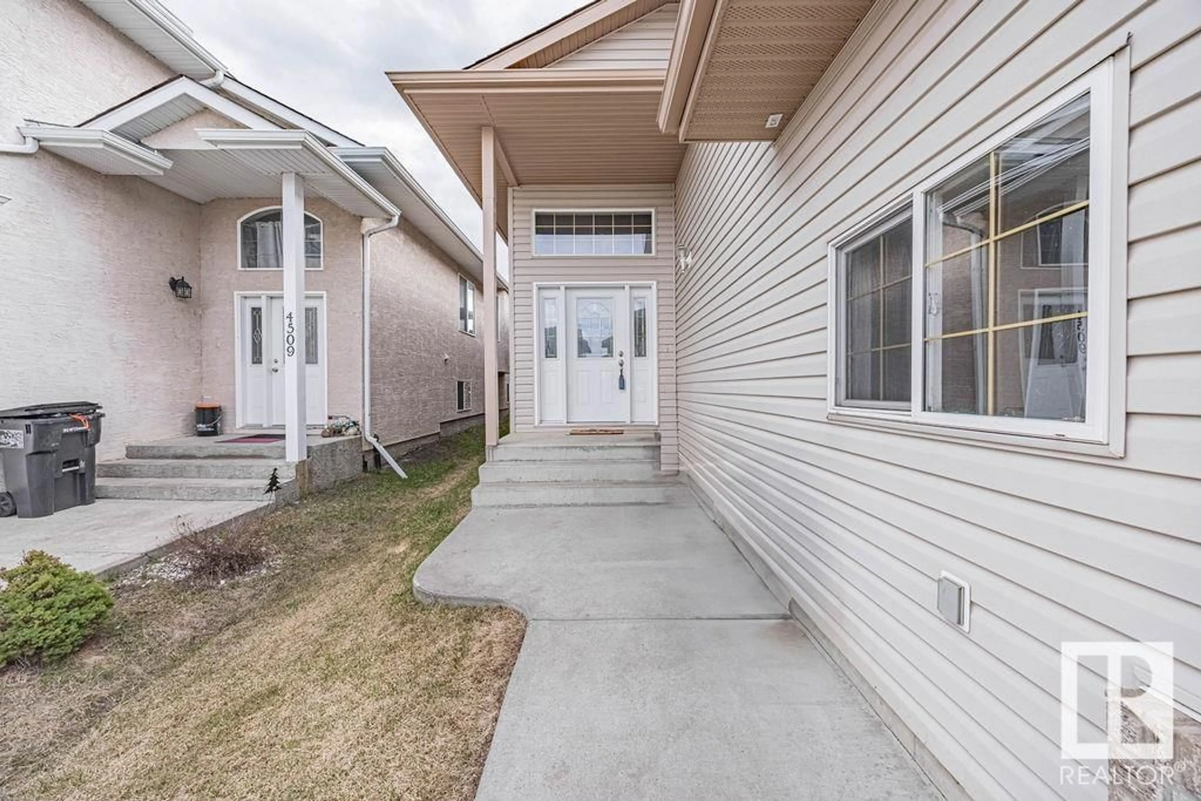 Home with vinyl exterior material, street for 4511 164A AV, Edmonton Alberta T5Y0C7