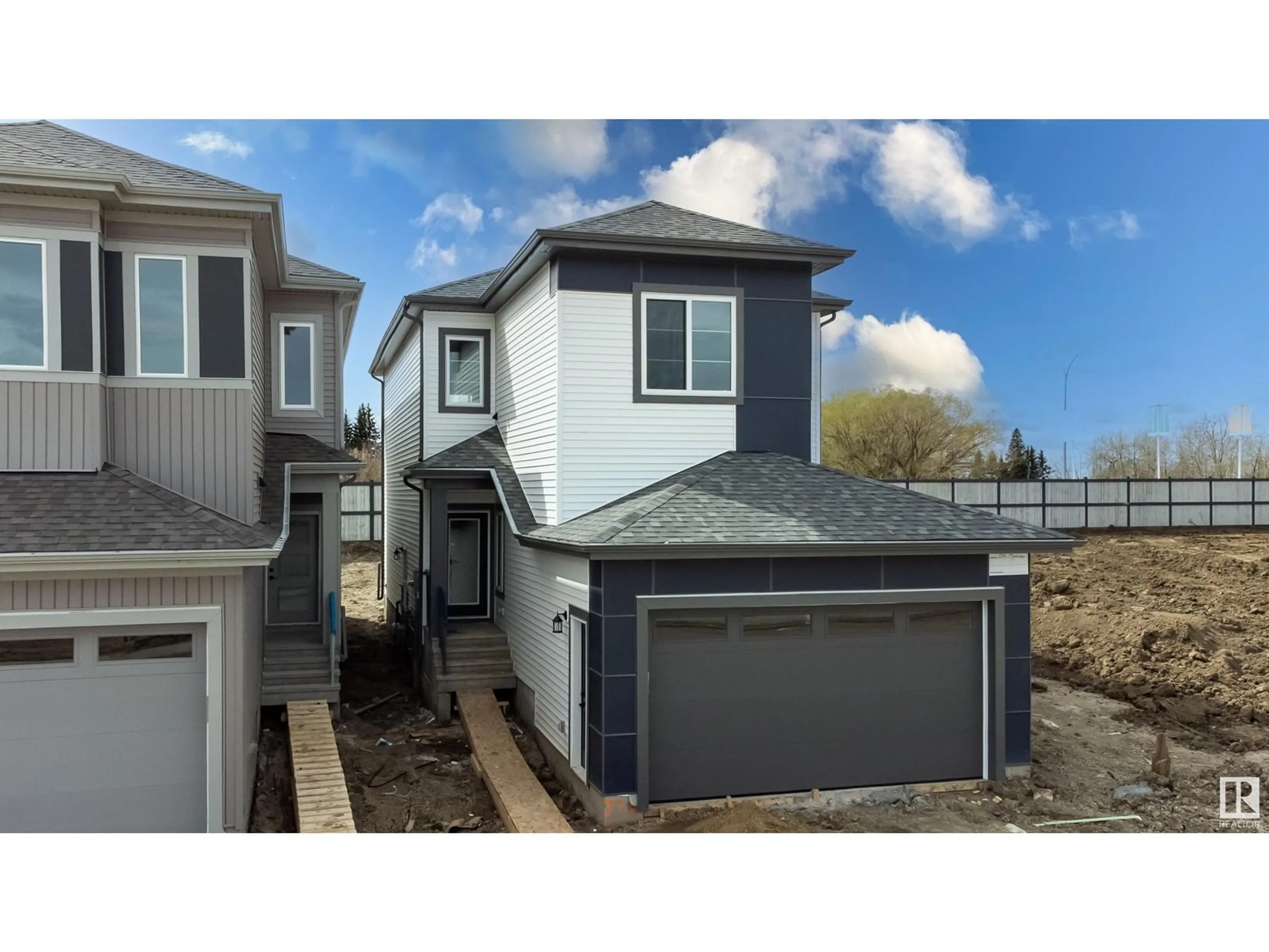 Home with vinyl exterior material, street for 276 MUNN WY, Leduc Alberta T9E0S9