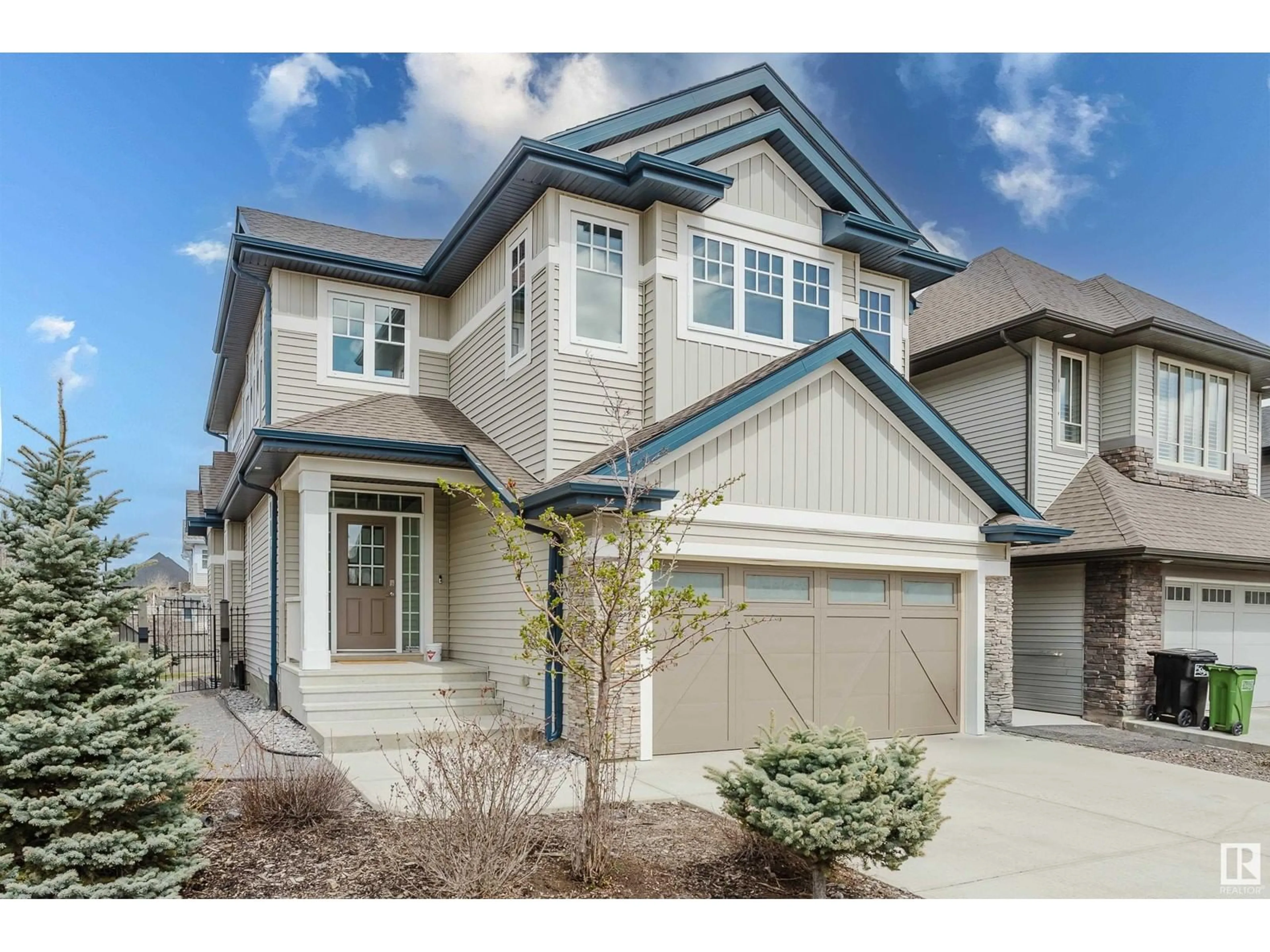 Home with vinyl exterior material, street for SW - 1990 AINSLIE LI, Edmonton Alberta T6W2M1