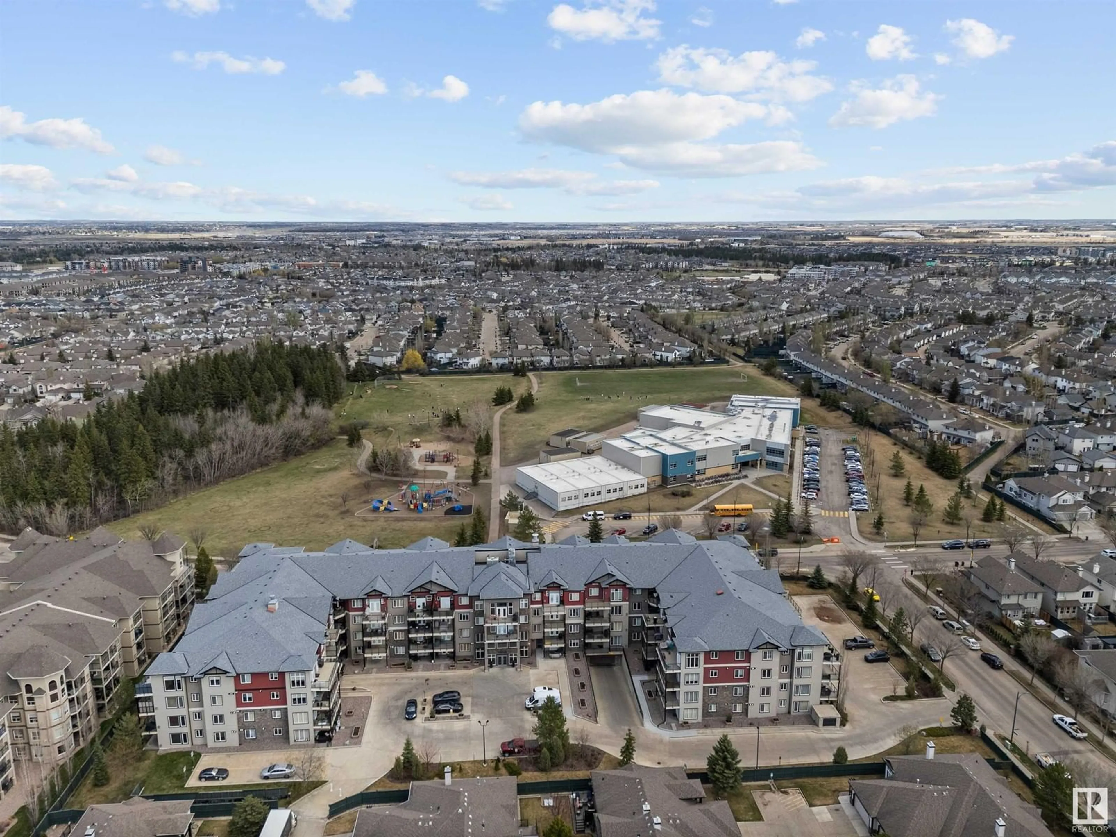 A pic from outside/outdoor area/front of a property/back of a property/a pic from drone, unknown for #220 - 12408 15 AV, Edmonton Alberta T6X1X2