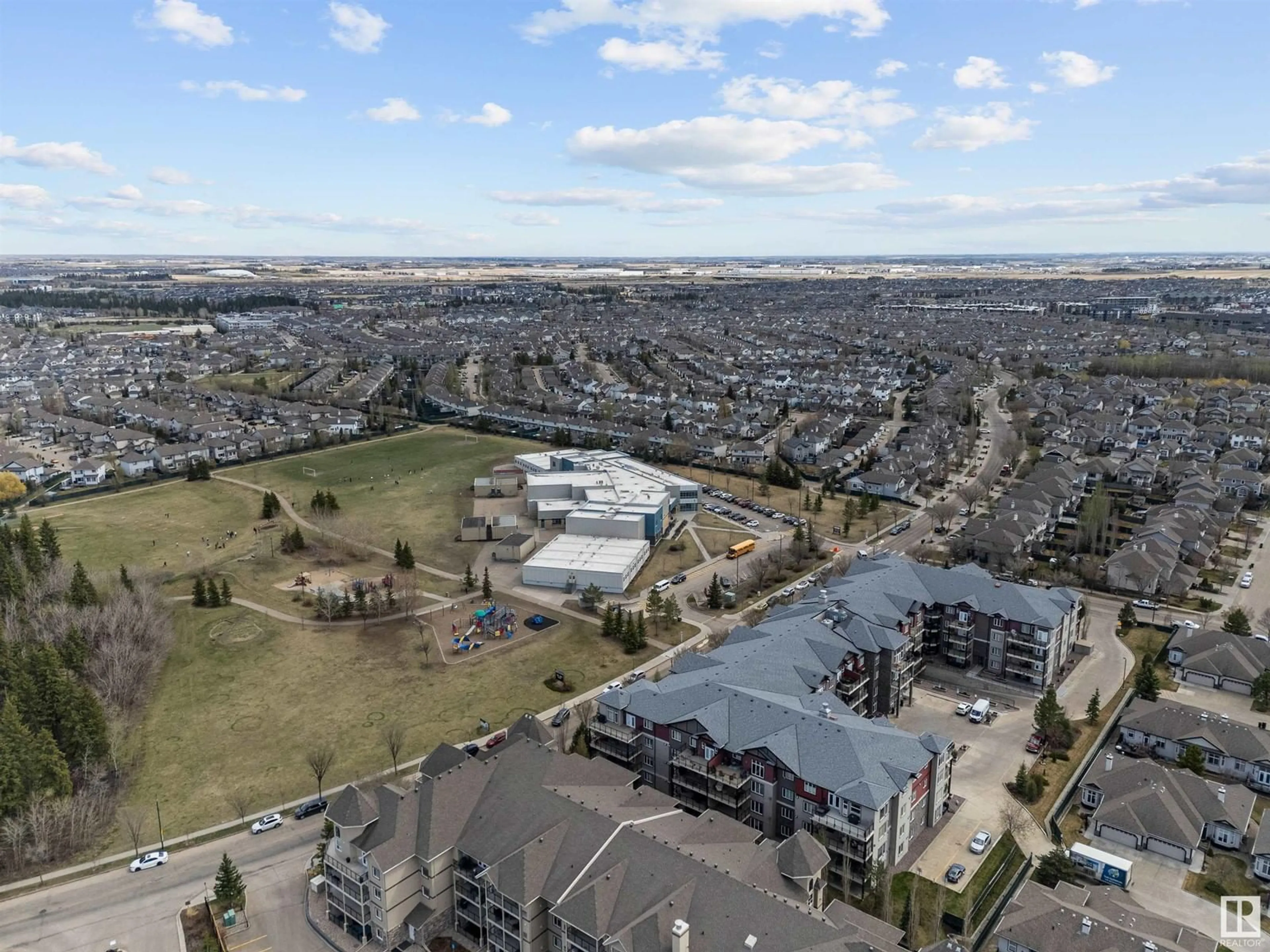 A pic from outside/outdoor area/front of a property/back of a property/a pic from drone, unknown for #220 - 12408 15 AV, Edmonton Alberta T6X1X2