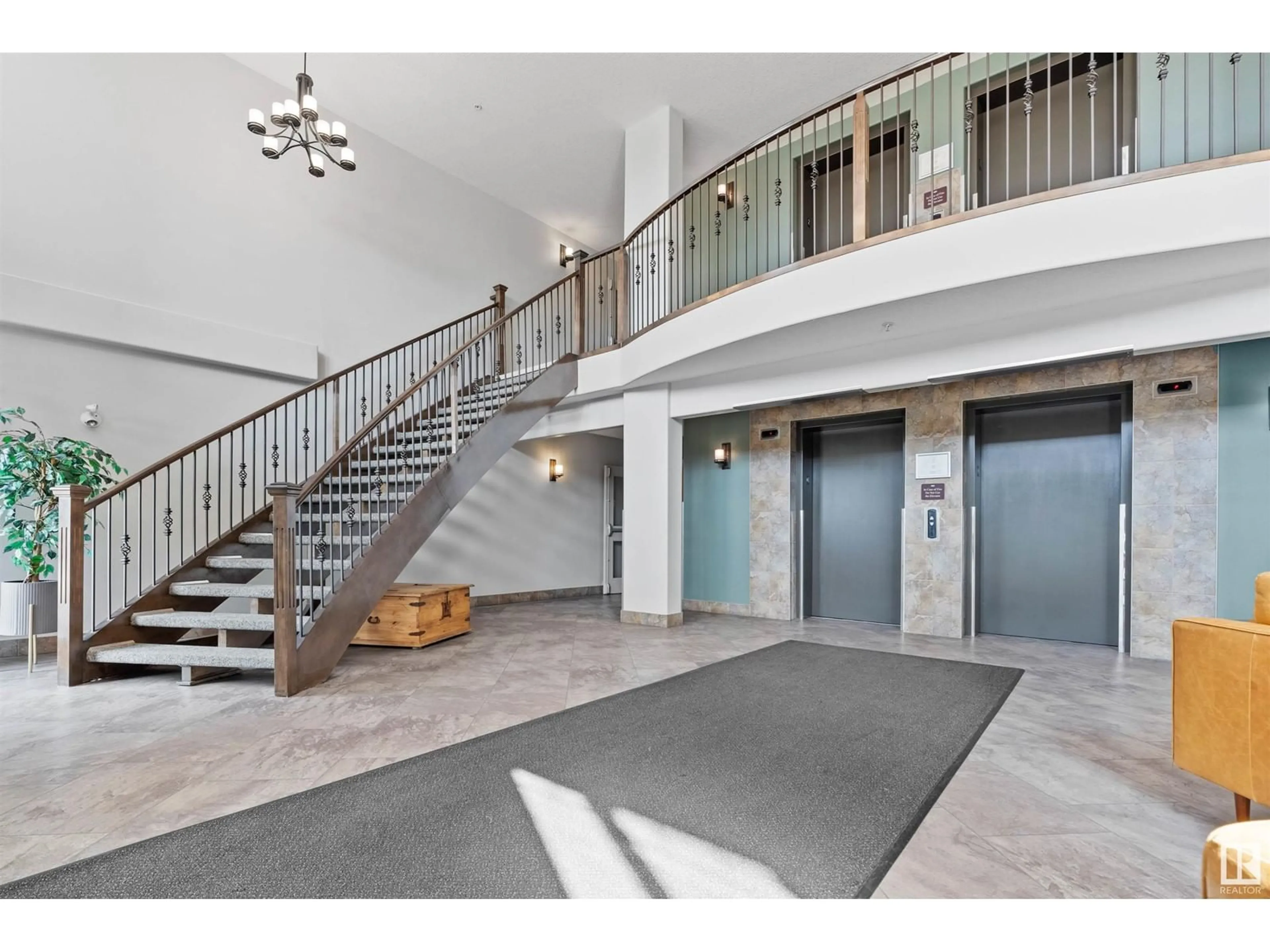 Indoor foyer for #220 - 12408 15 AV, Edmonton Alberta T6X1X2