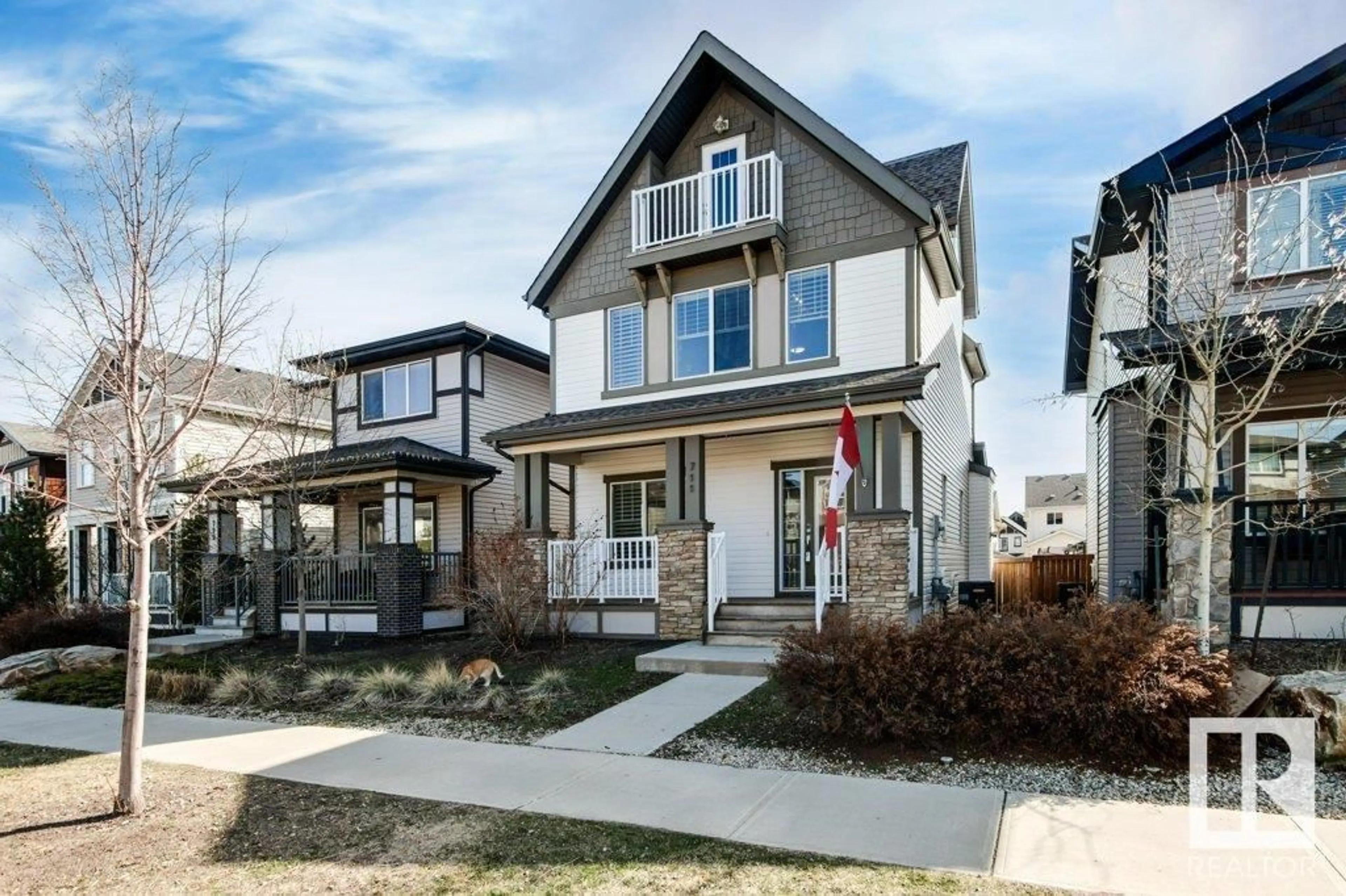 Home with vinyl exterior material, street for 711 SECORD BV, Edmonton Alberta T5T7A8