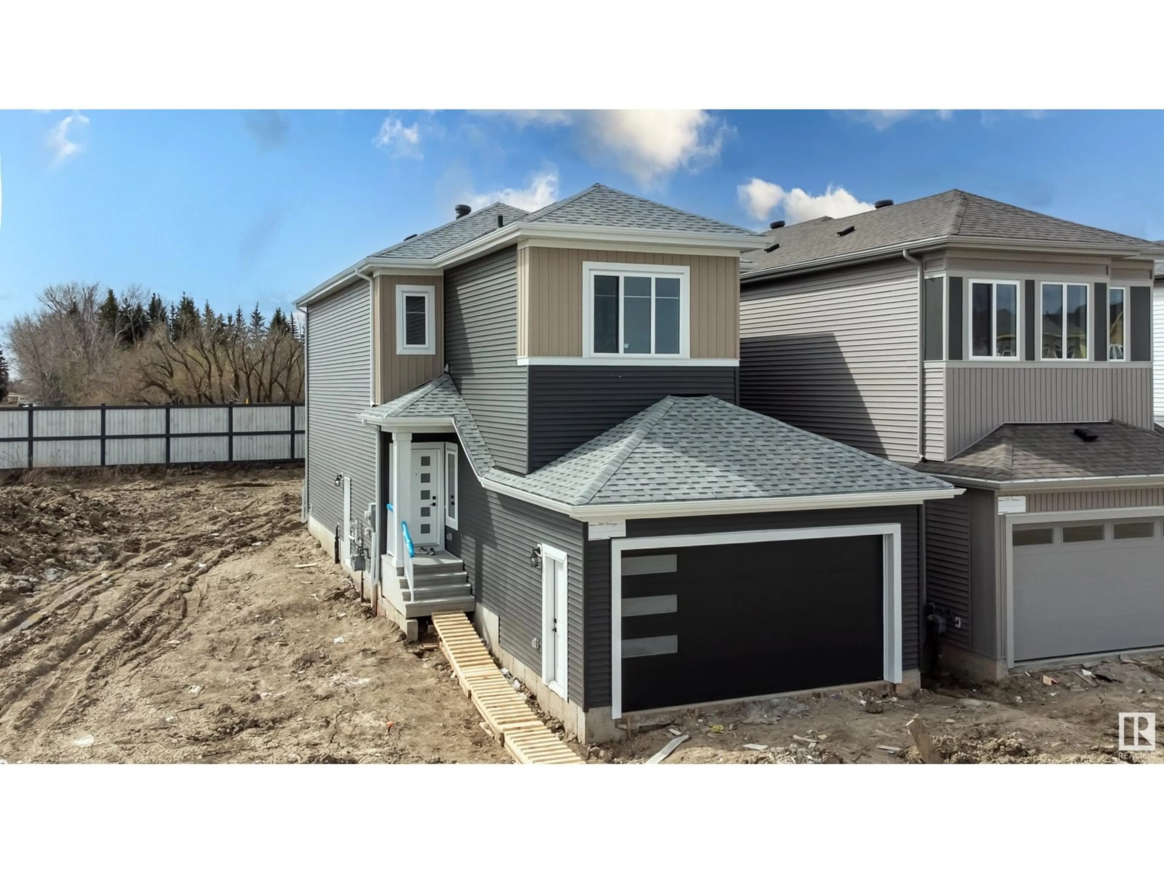 Home with vinyl exterior material, street for 280 MUNN WY, Leduc Alberta T9E0S9