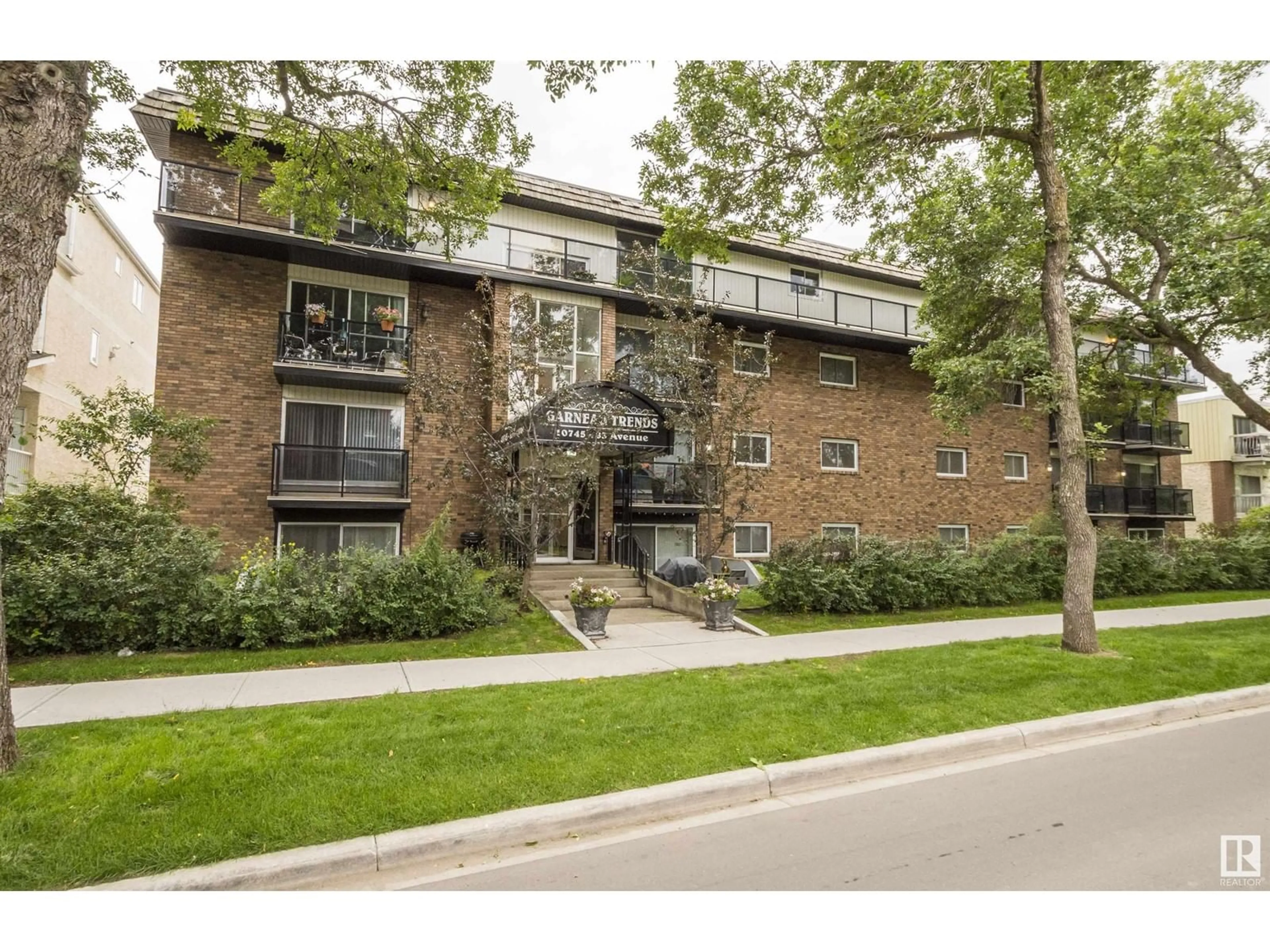 Home with brick exterior material, street for #201 - 10745 83 AV, Edmonton Alberta T6E2E5