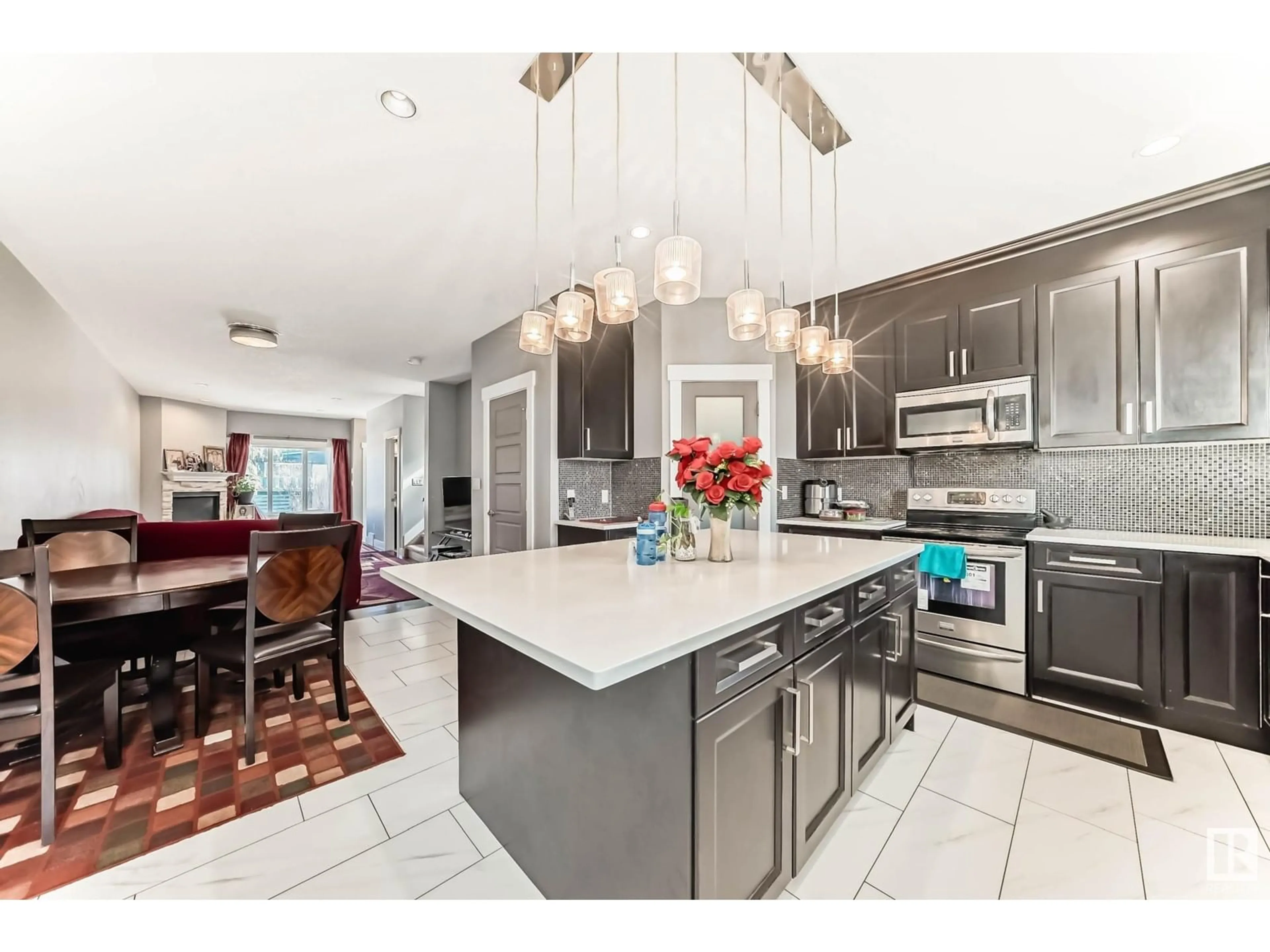 Open concept kitchen, ceramic/tile floor for 12728 118 ST, Edmonton Alberta T5E5K8