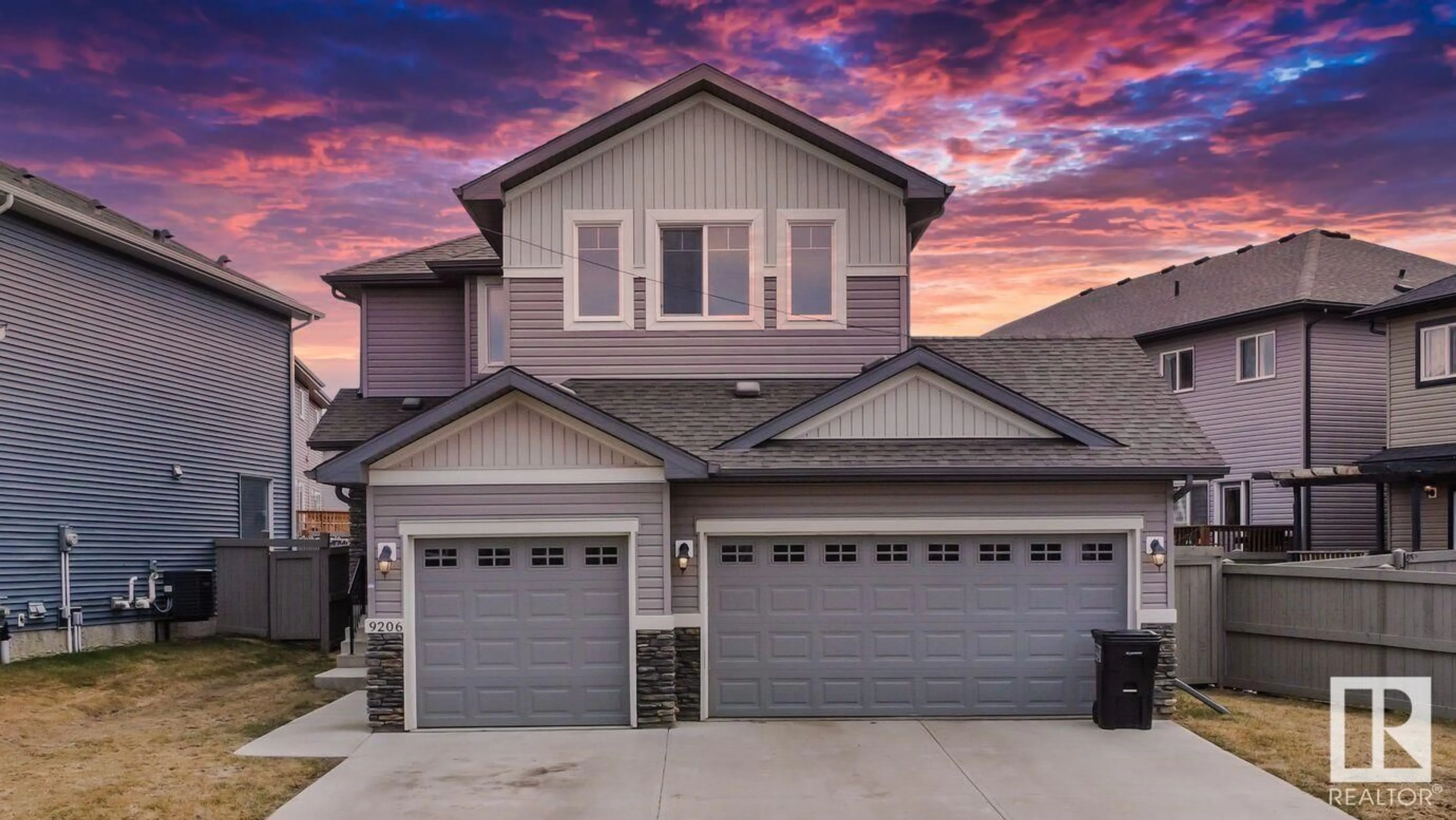 Home with vinyl exterior material, street for 9206 COOPER CR, Edmonton Alberta T6W3L1