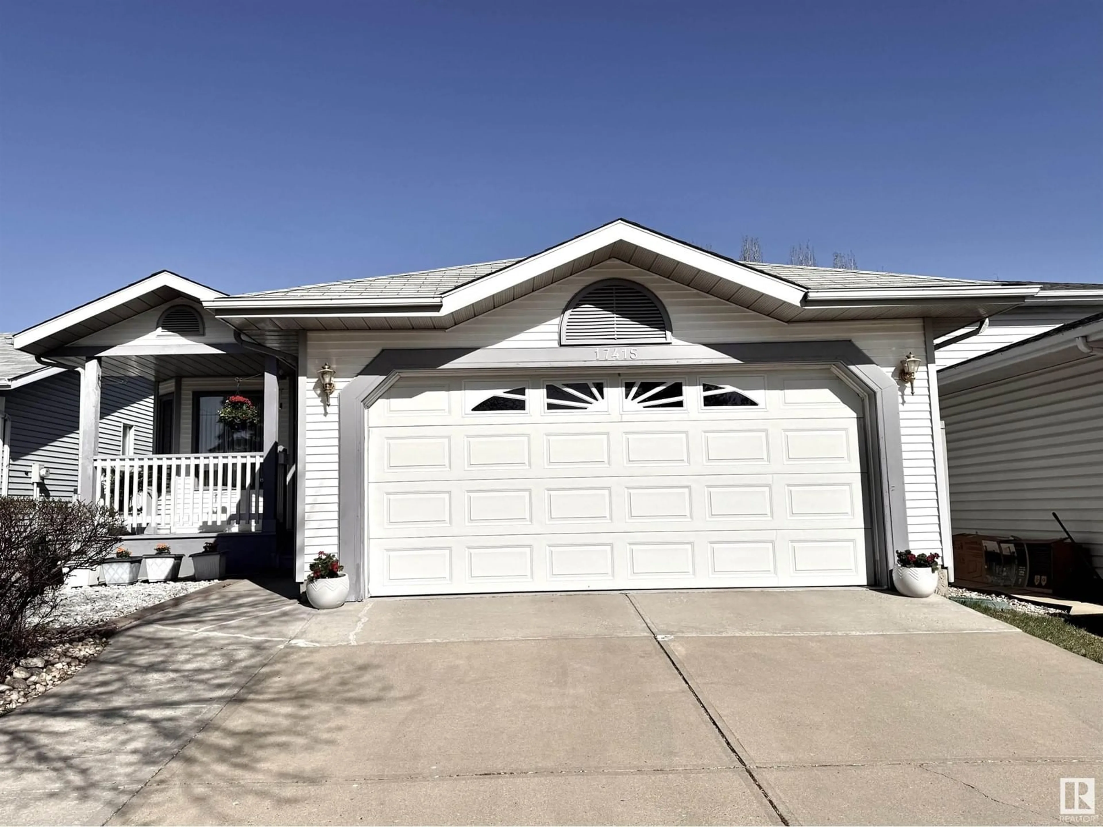 Home with vinyl exterior material, street for NW - 17415 91 ST, Edmonton Alberta T5Z2M3