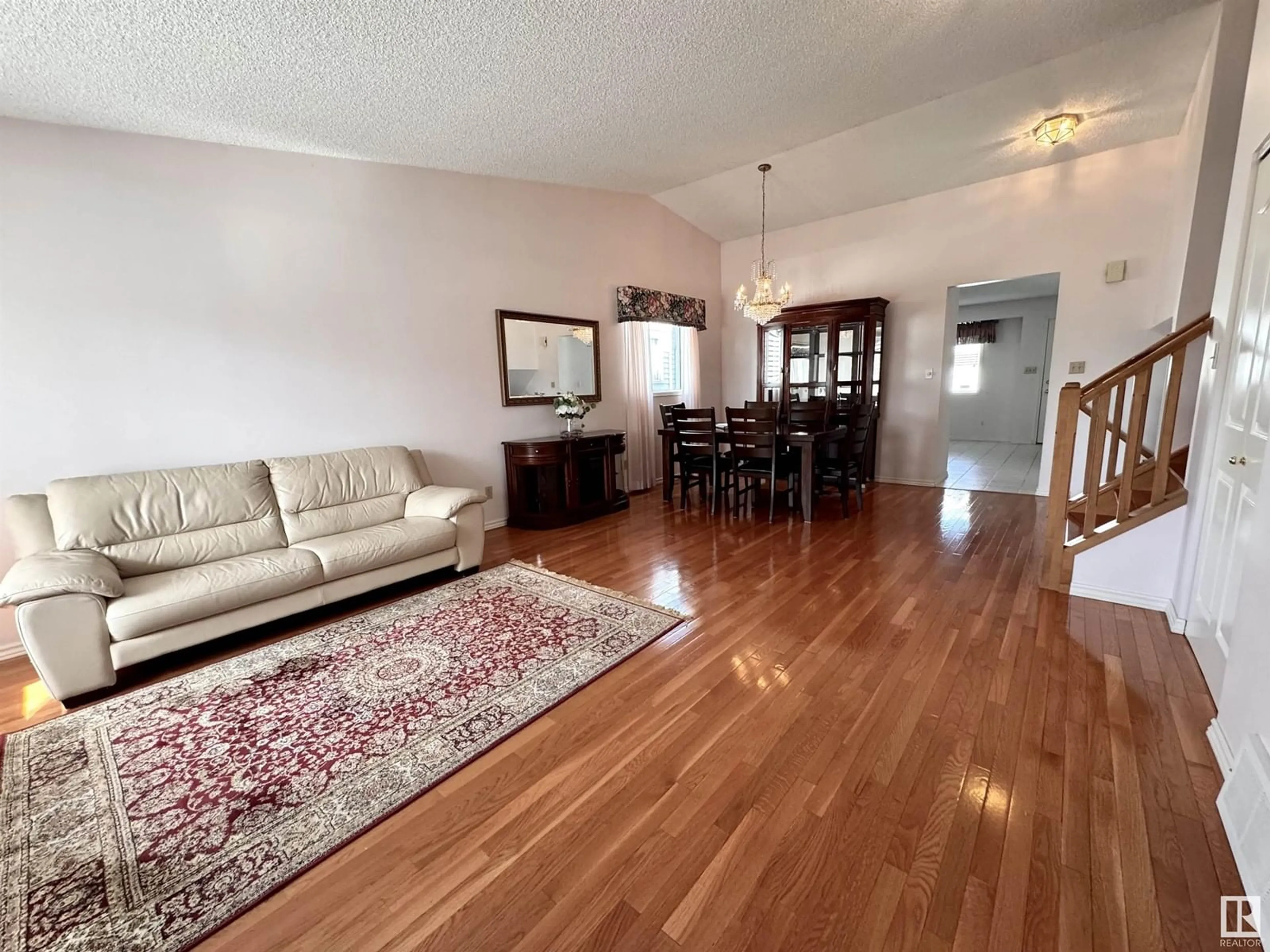 Living room with furniture, wood/laminate floor for NW - 17415 91 ST, Edmonton Alberta T5Z2M3