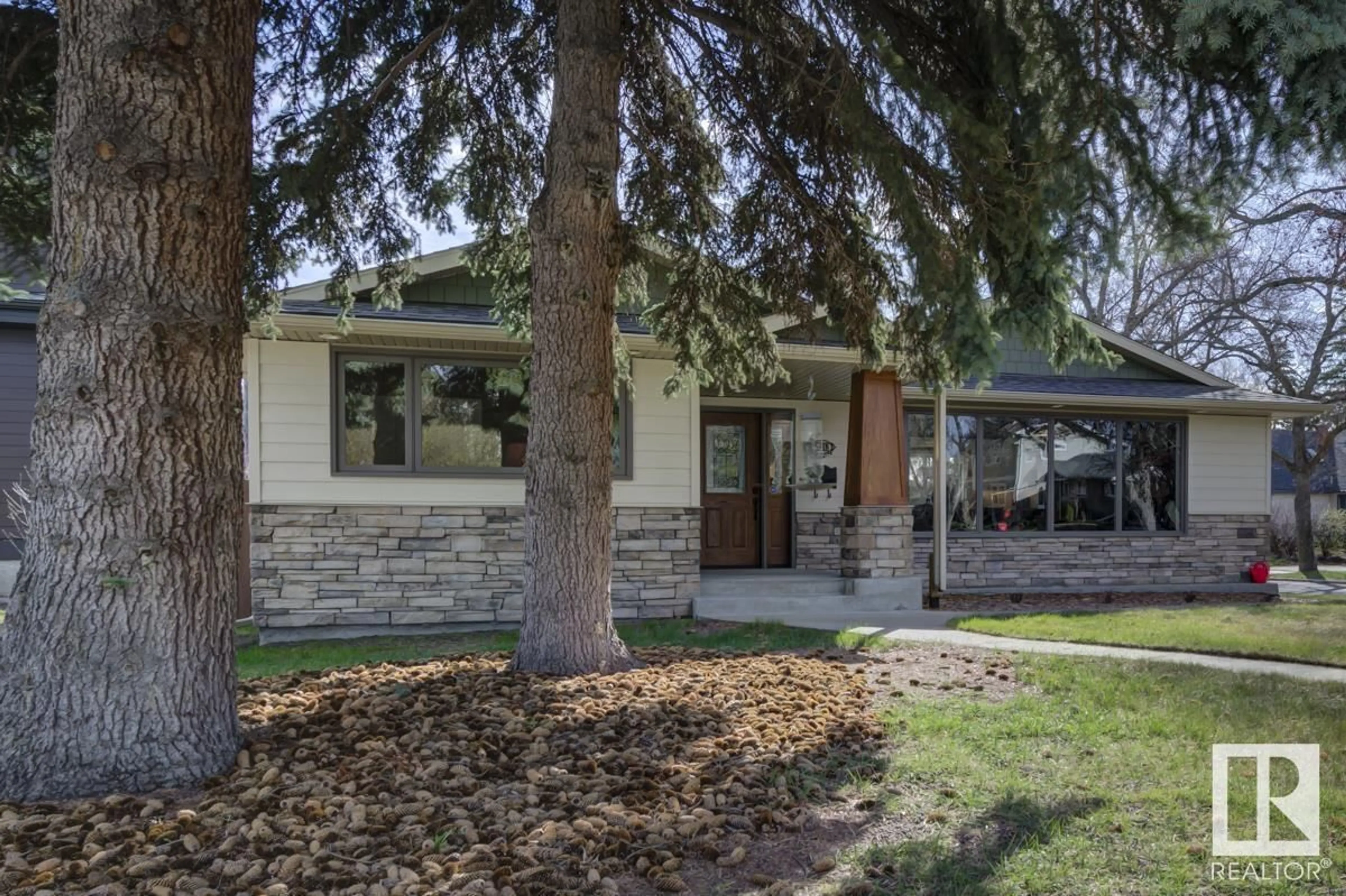 Home with brick exterior material, street for 5318 111 AV, Edmonton Alberta T5W0K5