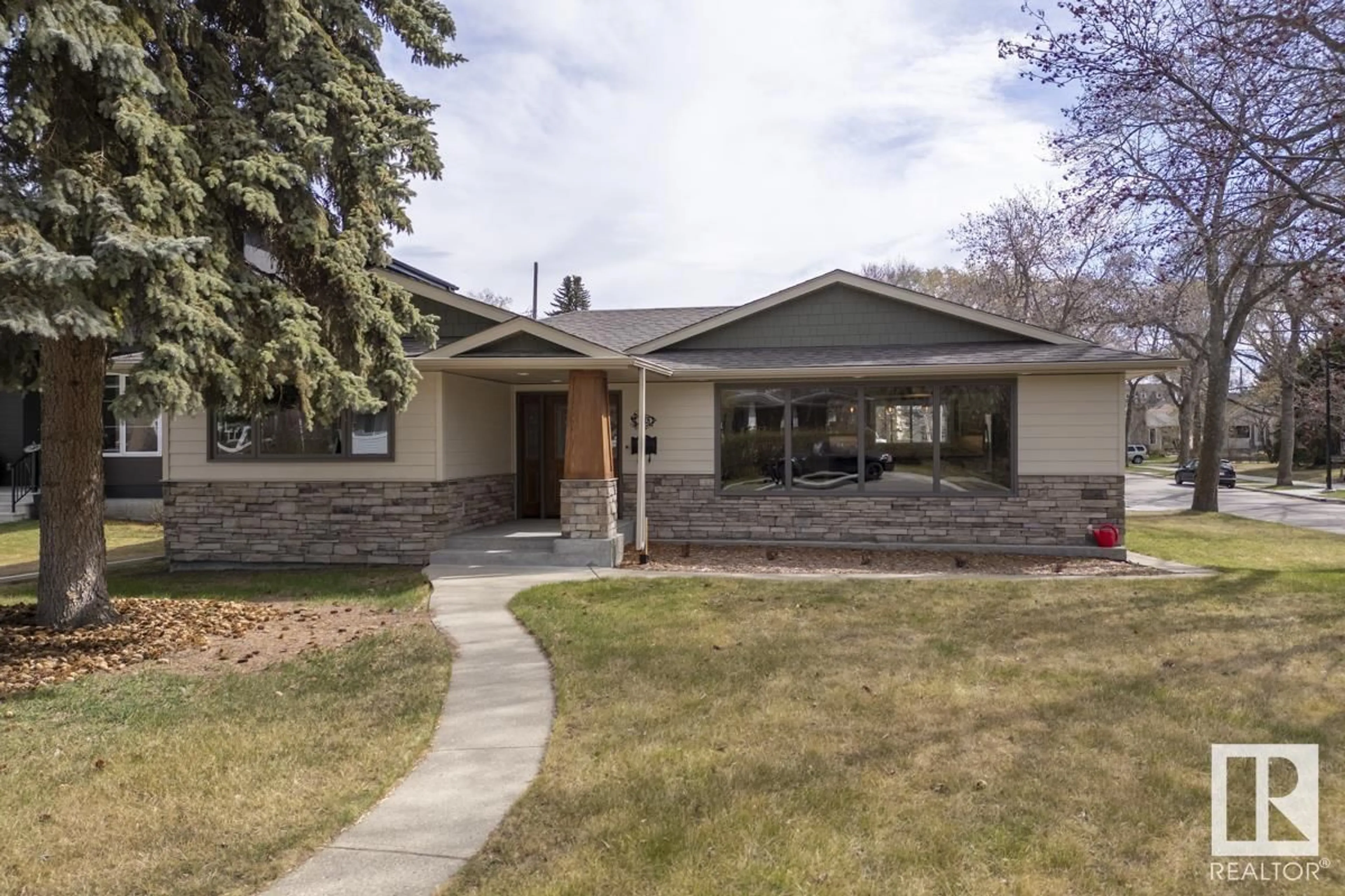 Home with brick exterior material, street for 5318 111 AV, Edmonton Alberta T5W0K5